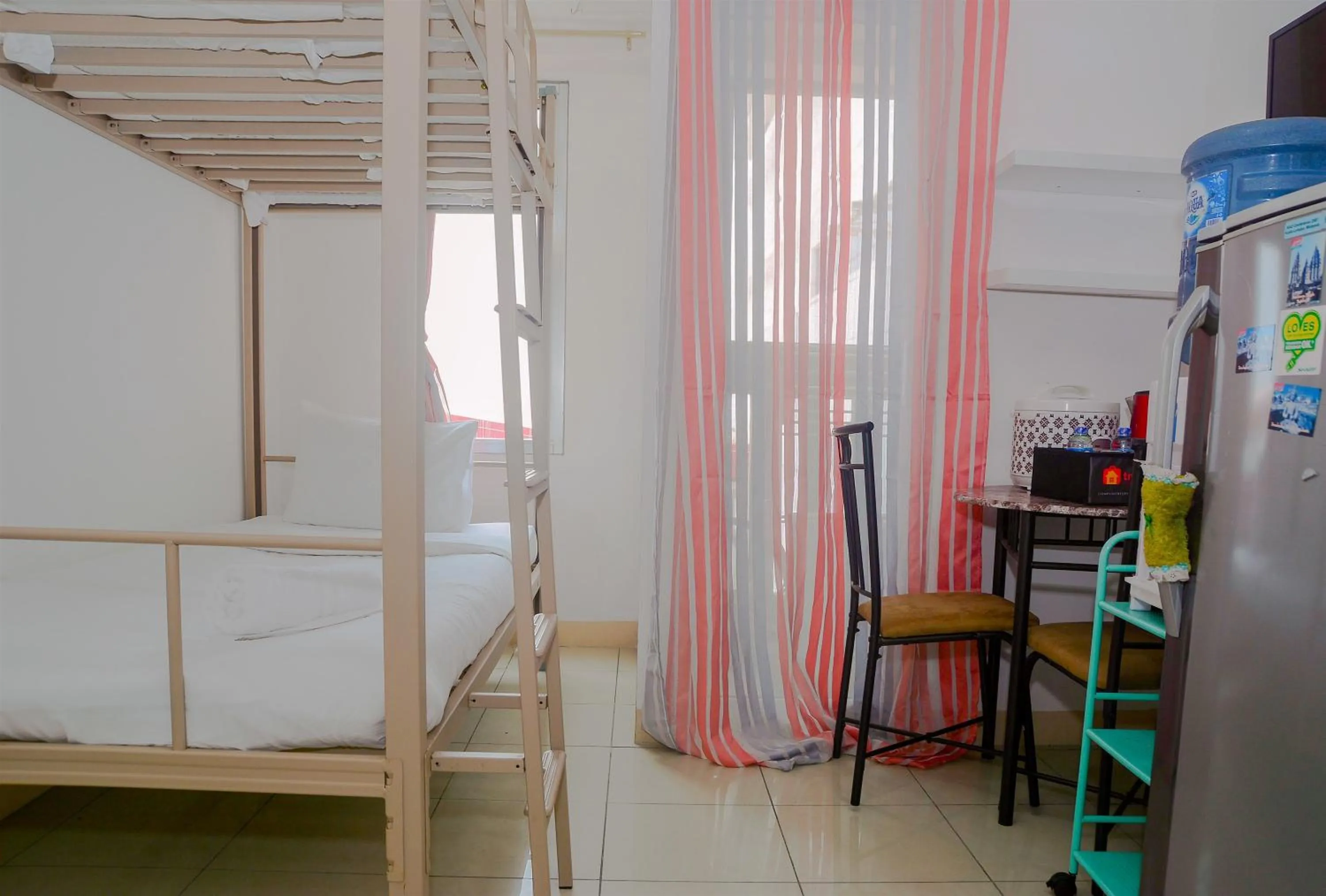 Bed in Green Bay Pluit Studio Apartment with 2 Single Beds By Travelio