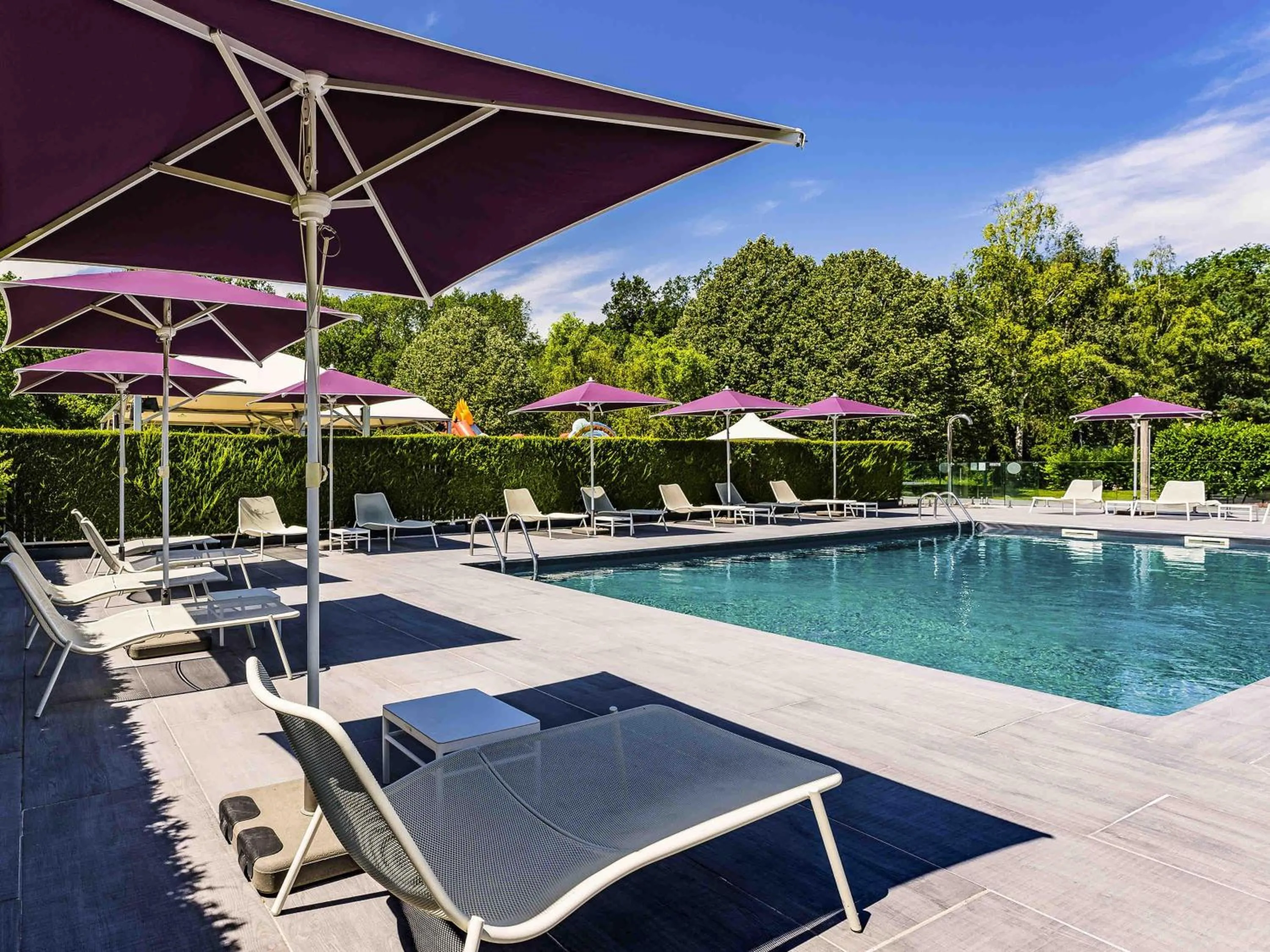 Pool view in Novotel Orléans Saint Jean de Braye