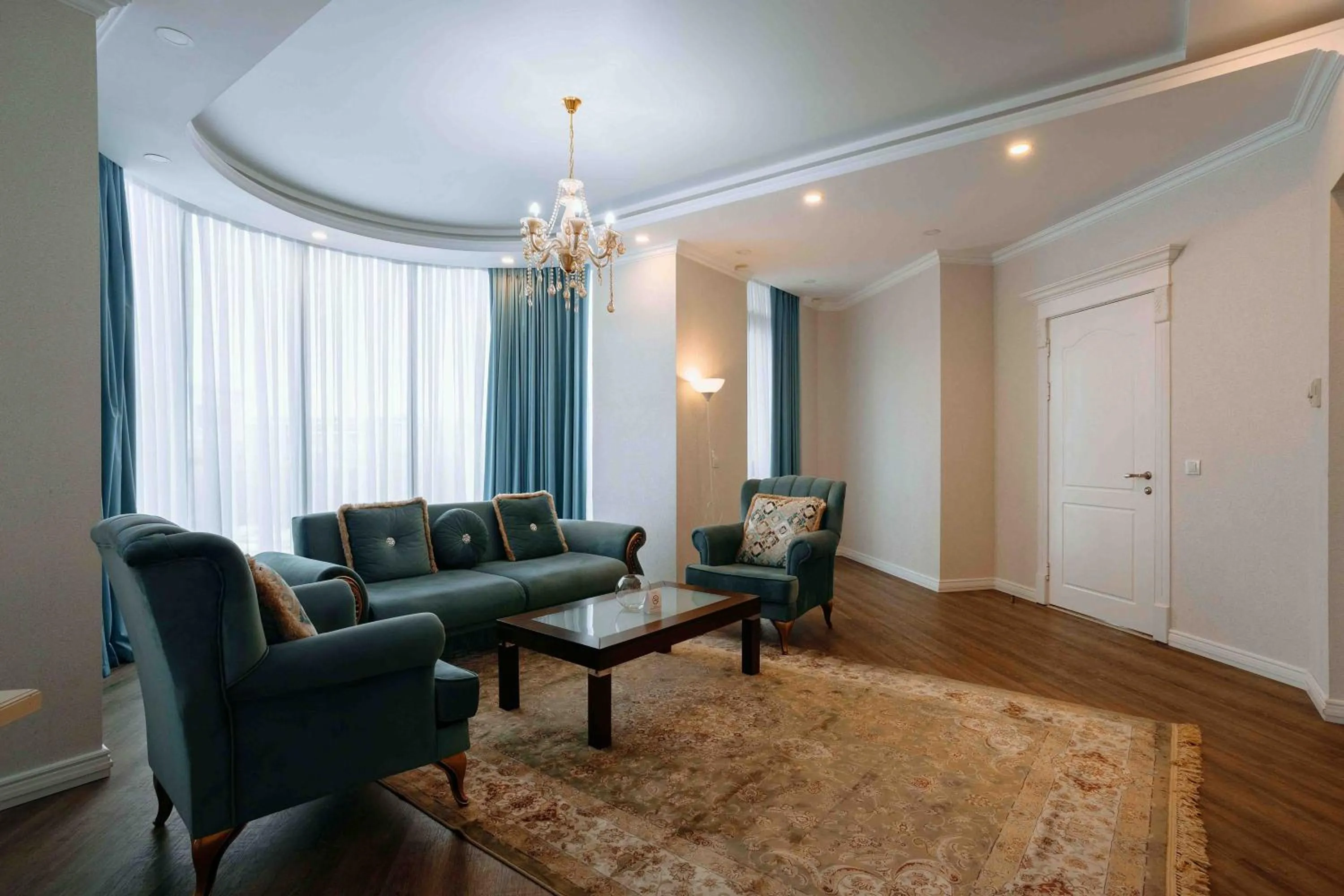 Living room in Ramada by Wyndham Shymkent