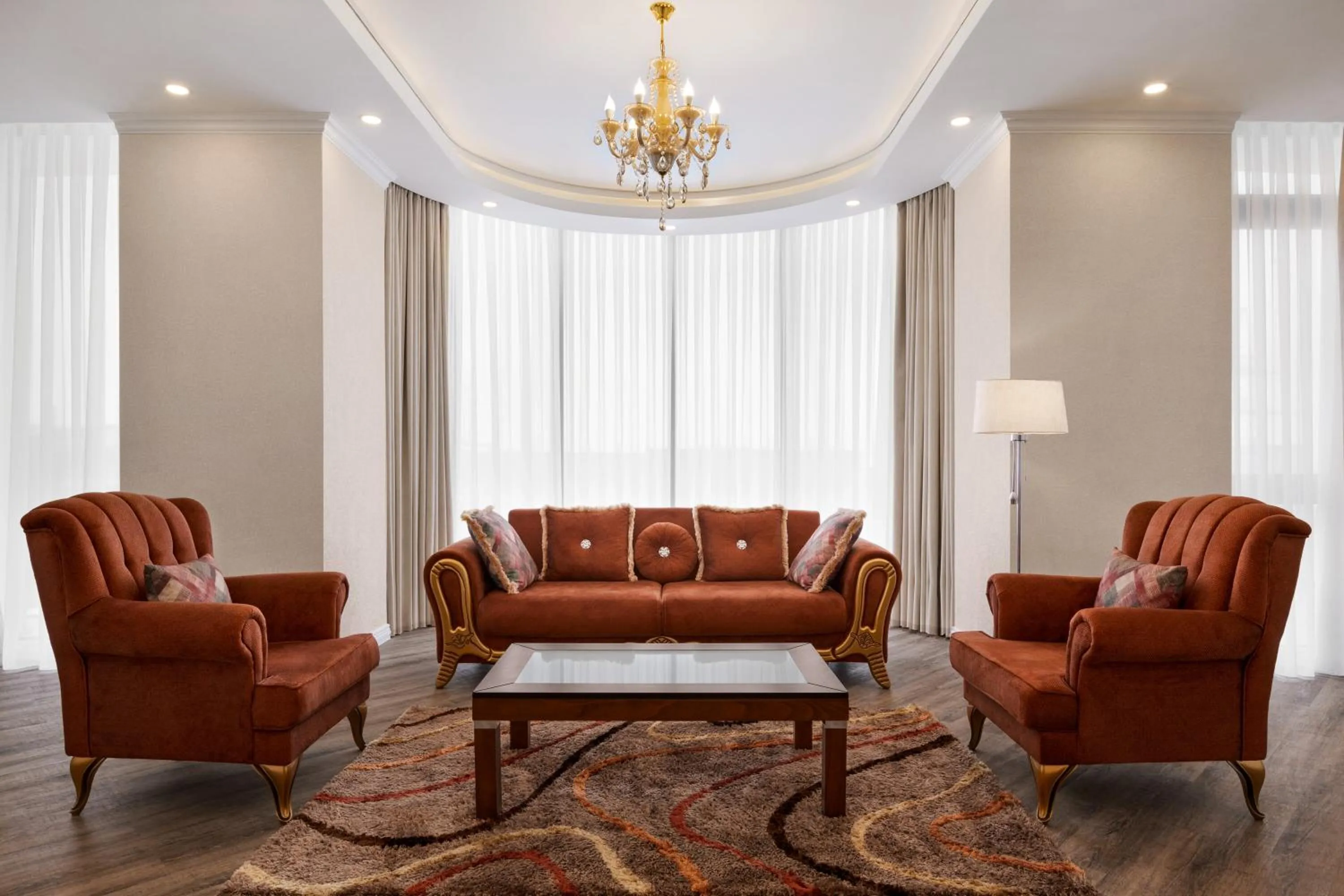 Living room in Ramada by Wyndham Shymkent