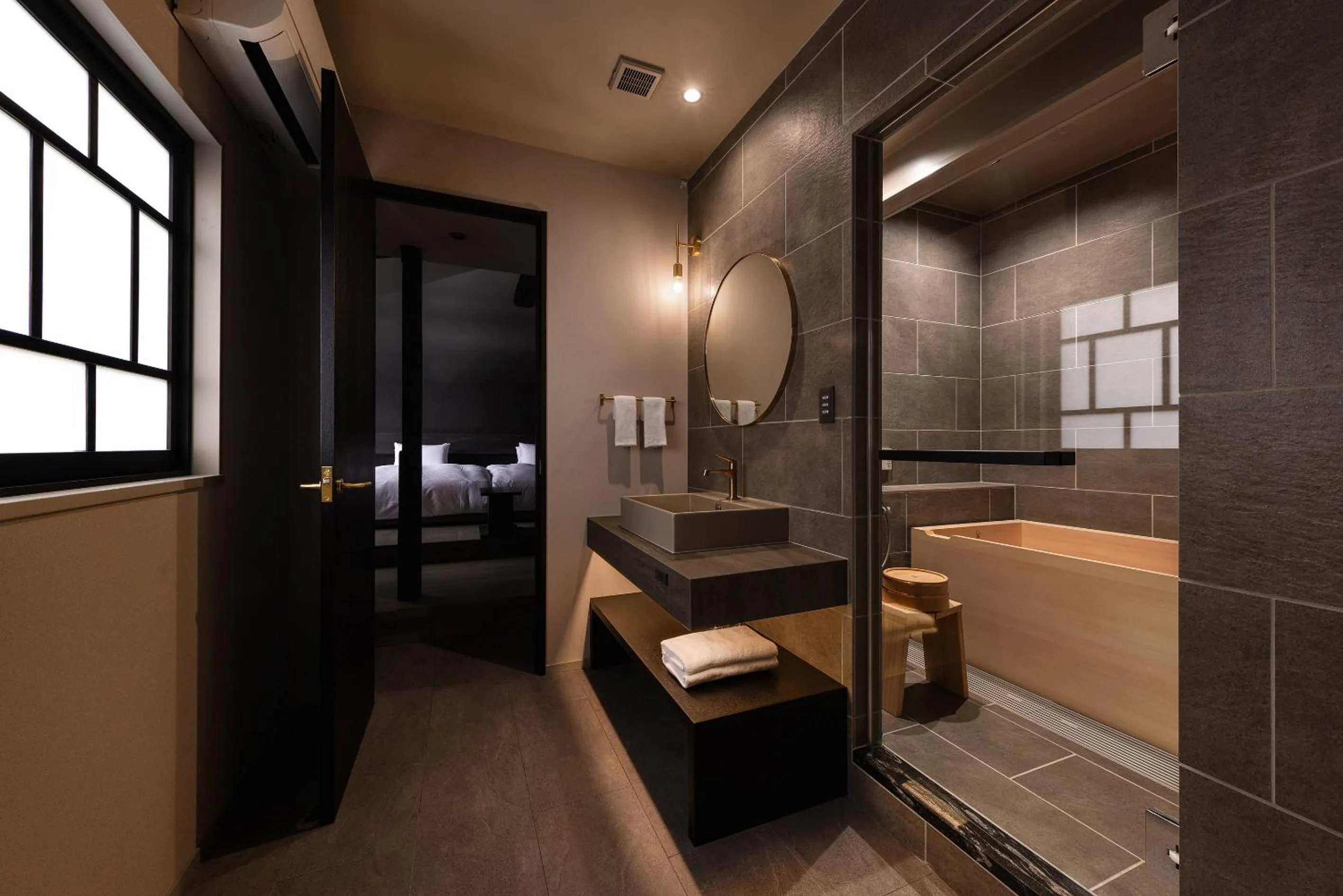 Bed in Tomonoura Shiomachi Hotel