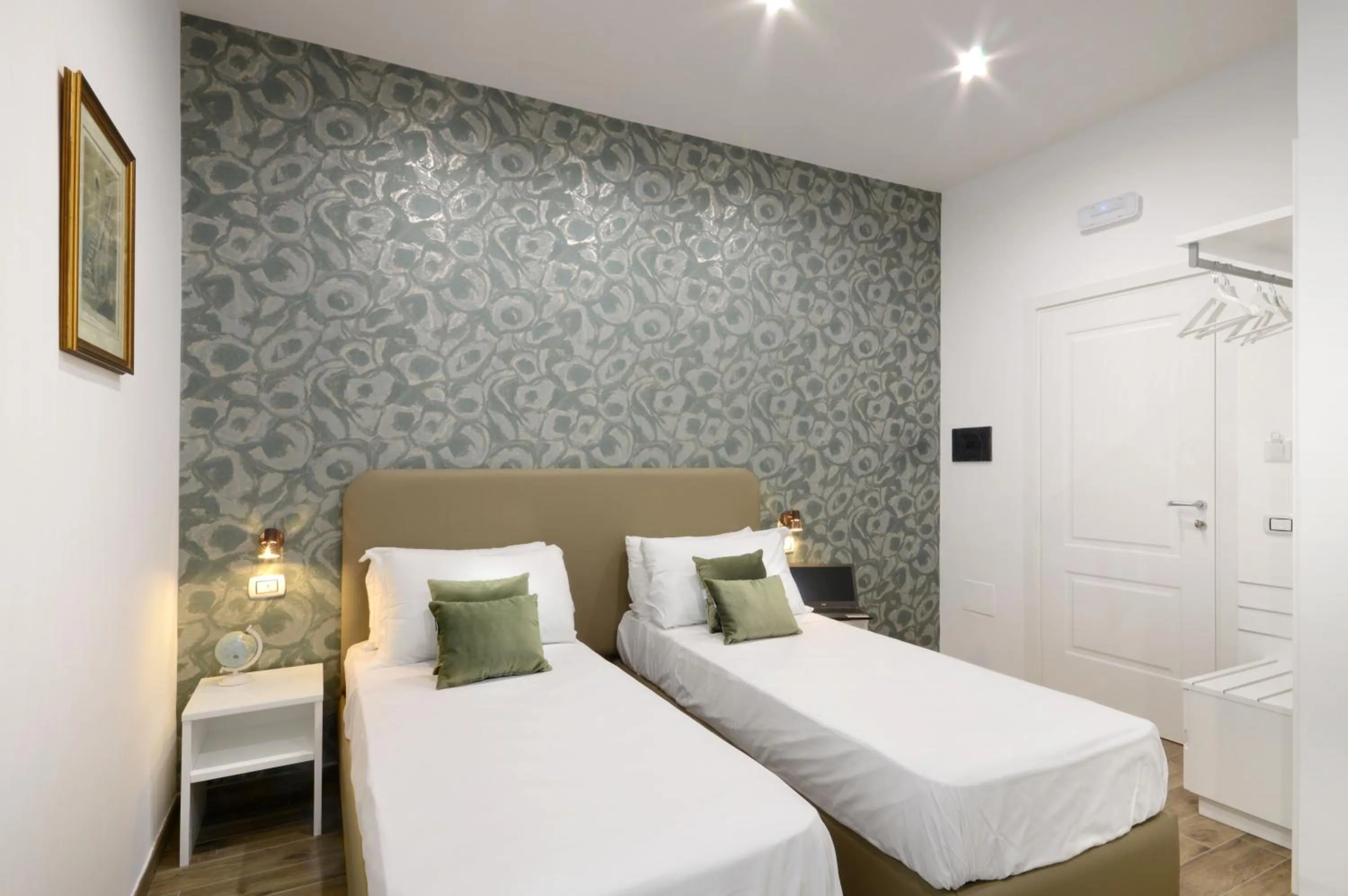 Bed in Napoliseason Rooms & Breakfast