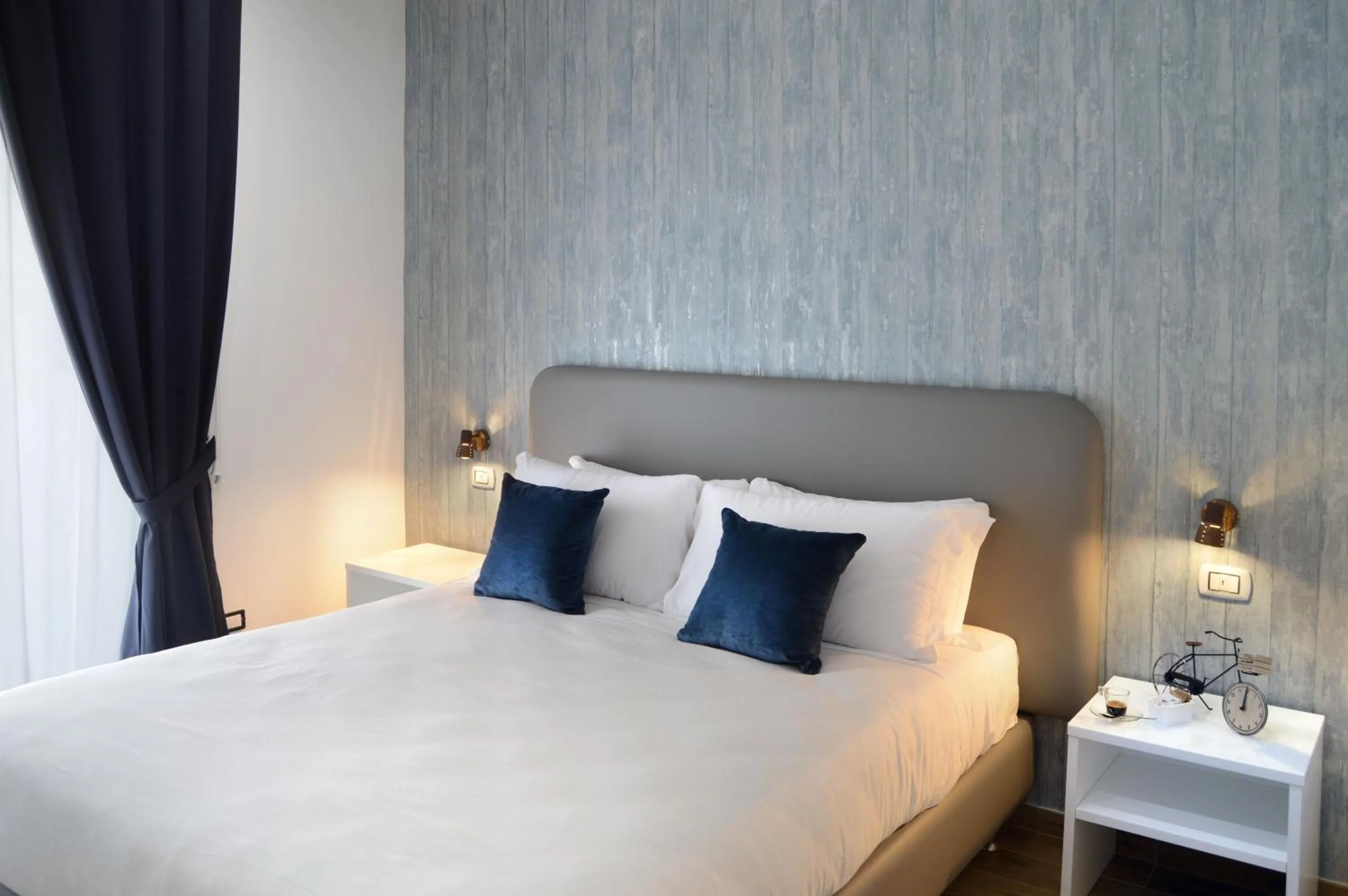 Bed in Napoliseason Rooms & Breakfast