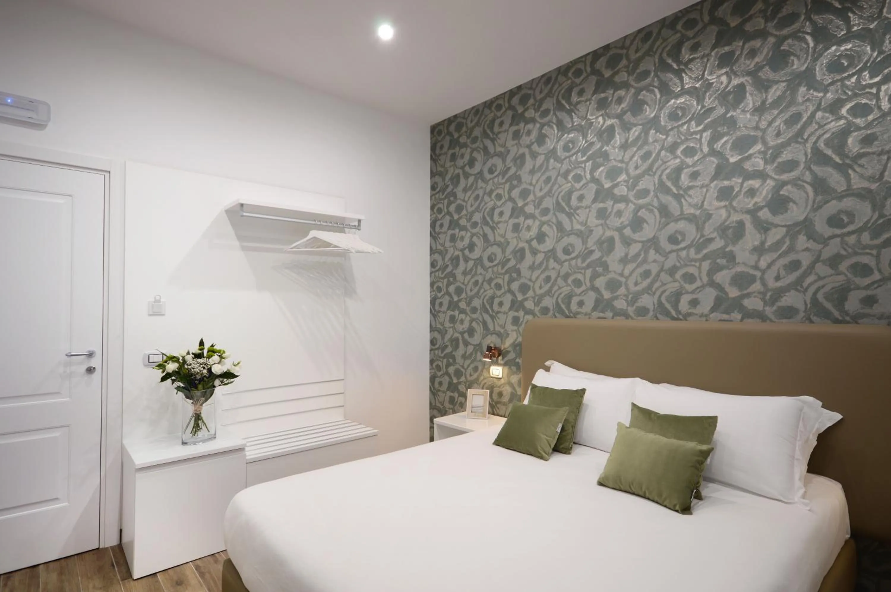 Bed in Napoliseason Rooms & Breakfast