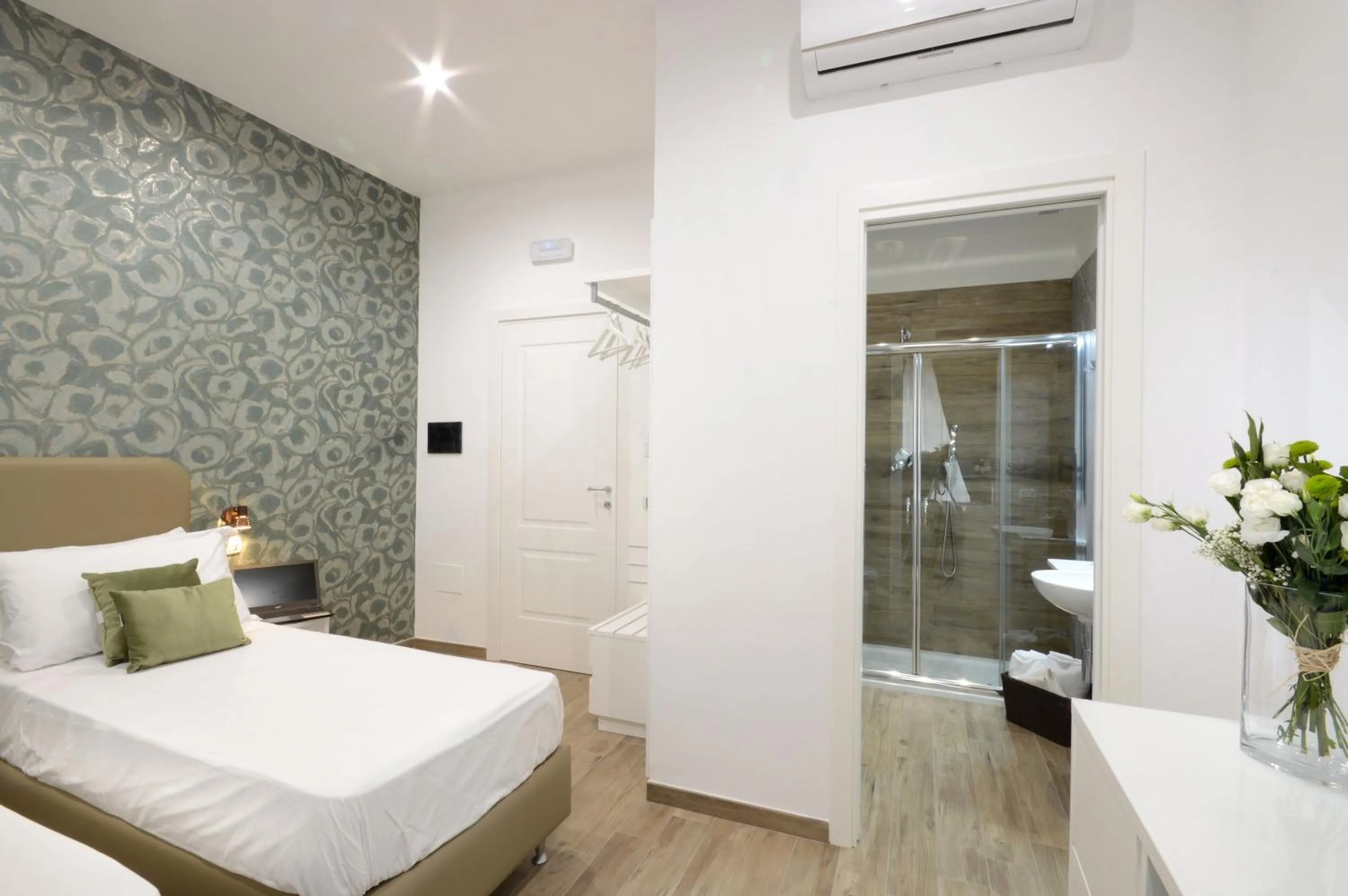 Bed in Napoliseason Rooms & Breakfast