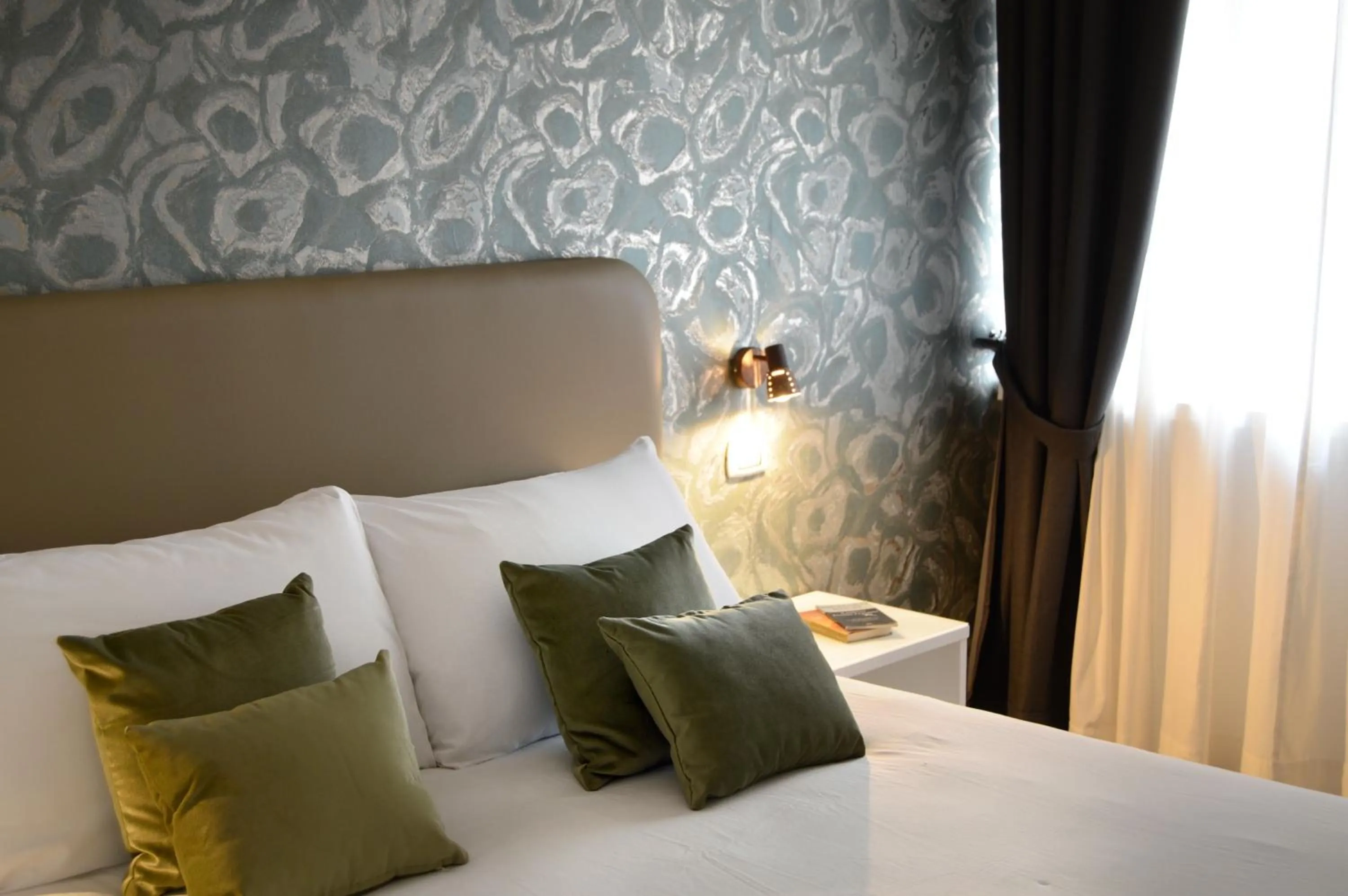 Bed in Napoliseason Rooms & Breakfast