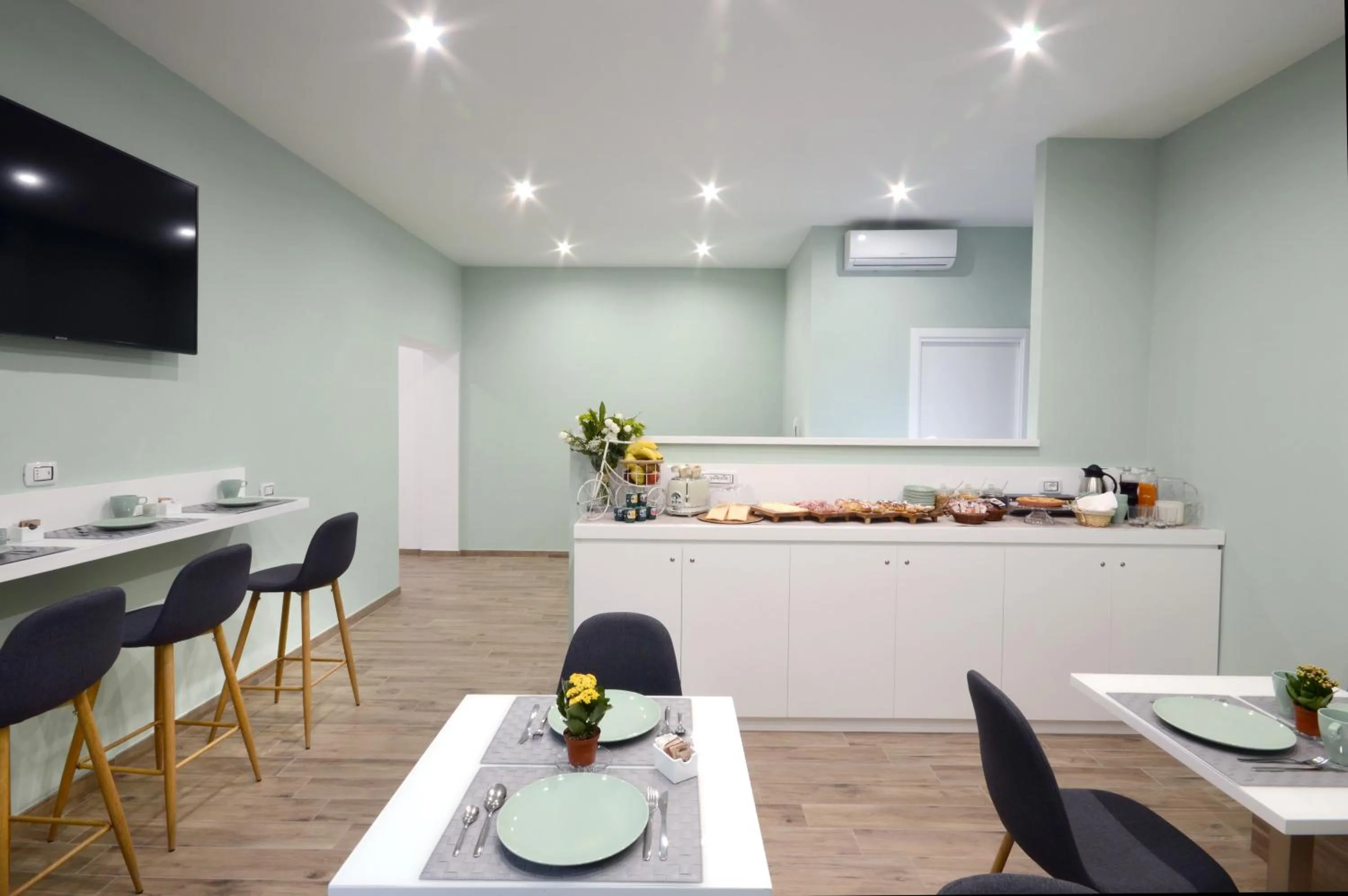 Communal lounge/ TV room in Napoliseason Rooms & Breakfast