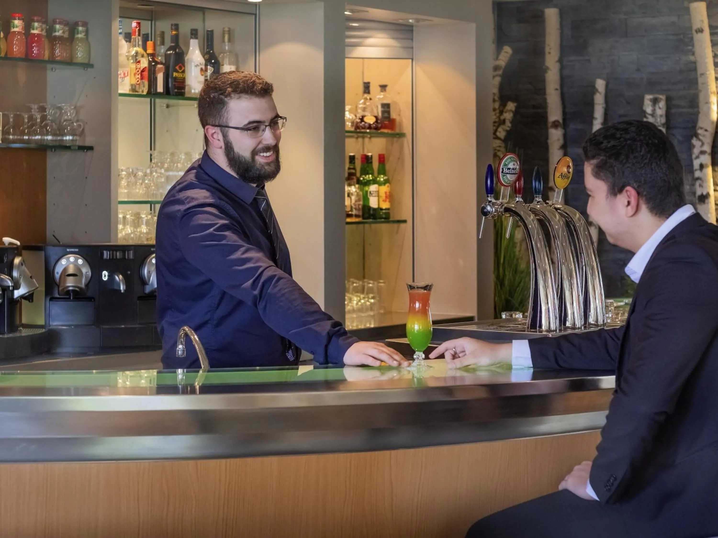 Lounge or bar in Novotel Amboise