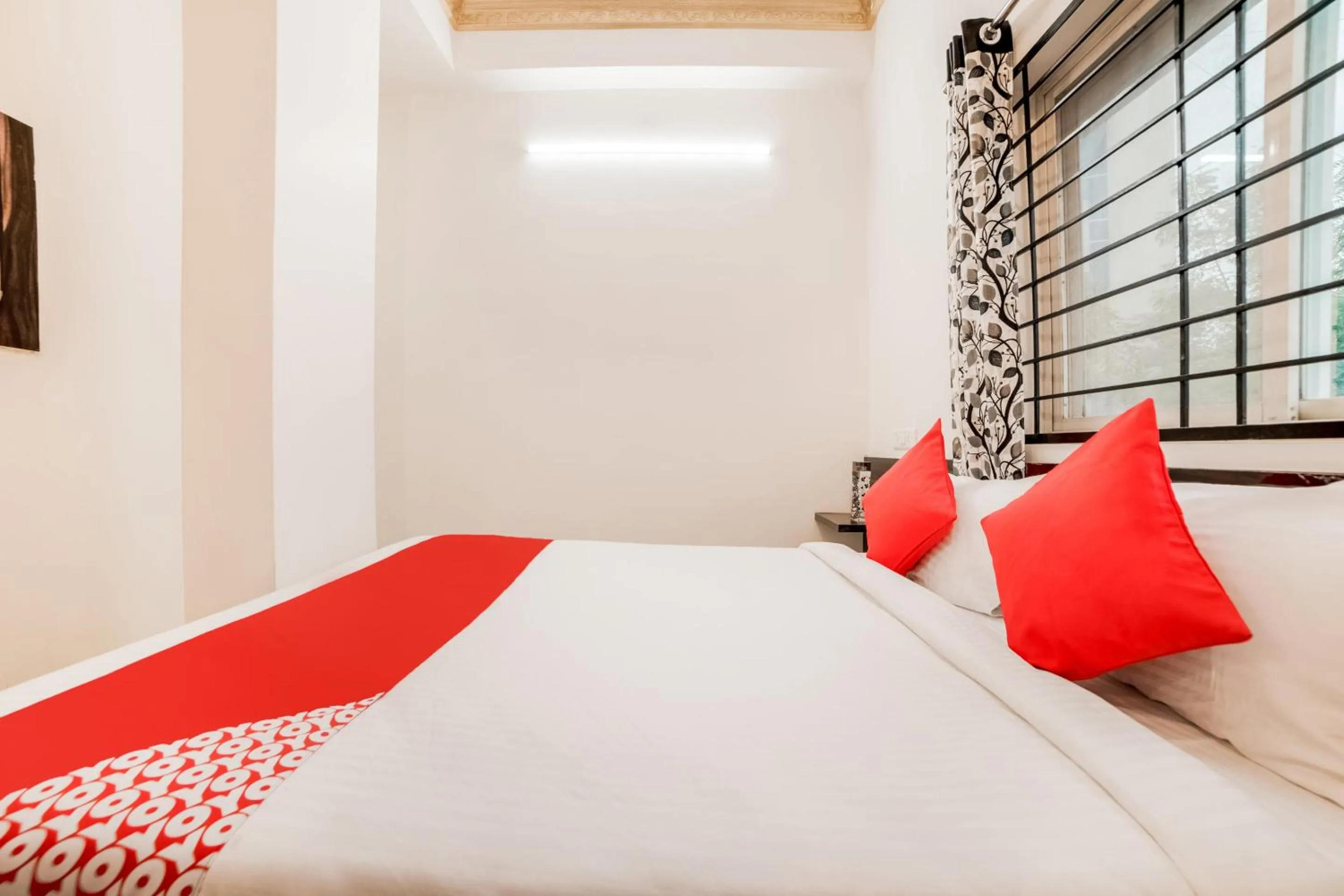 Bedroom, Bed in Super Hotel O Lucky Hotels Gachibowli