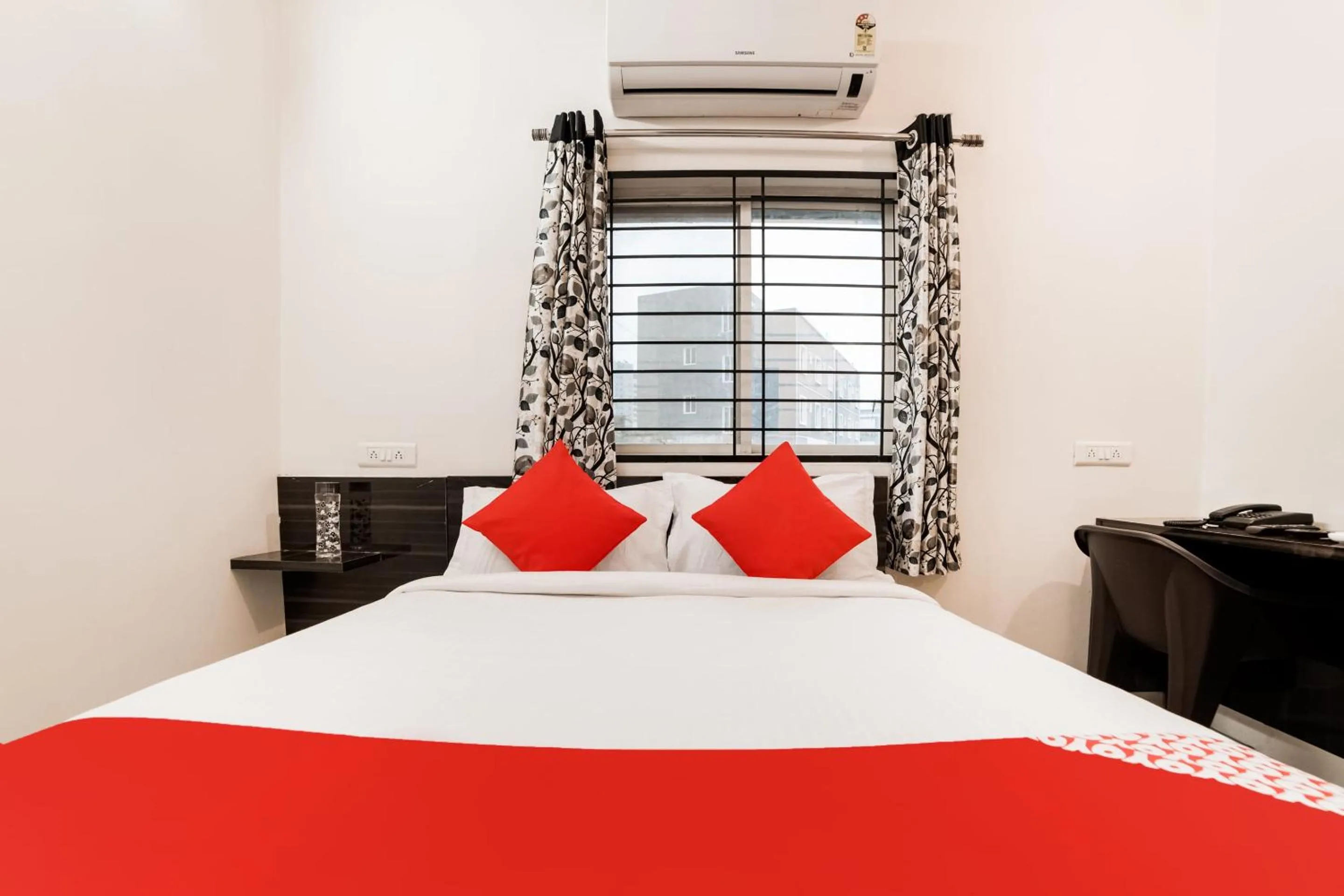 Bedroom, Bed in Super Hotel O Lucky Hotels Gachibowli