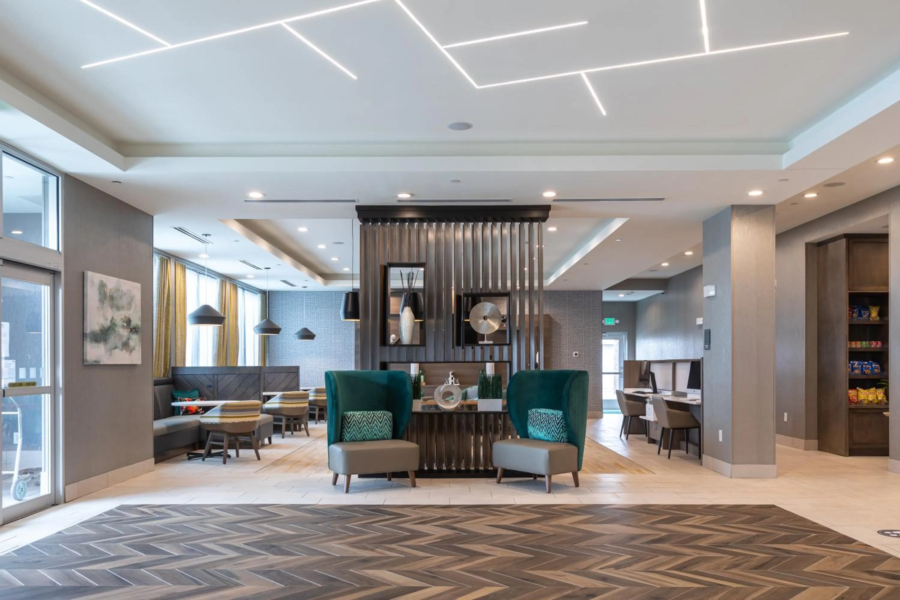 Communal lounge/ TV room in Holiday Inn Greenville - Woodruff Road by IHG