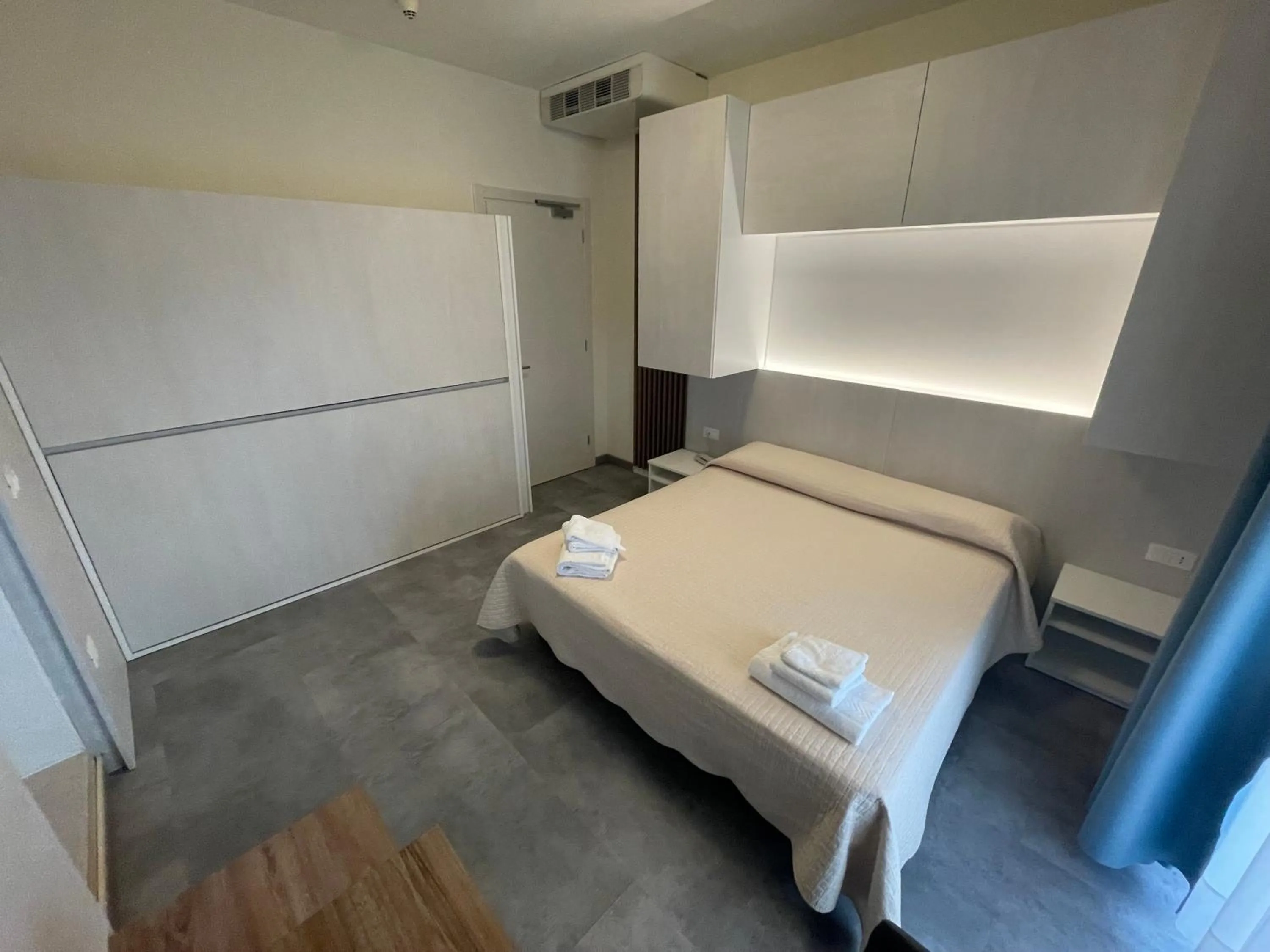 Bed in Hotel Catto Suisse