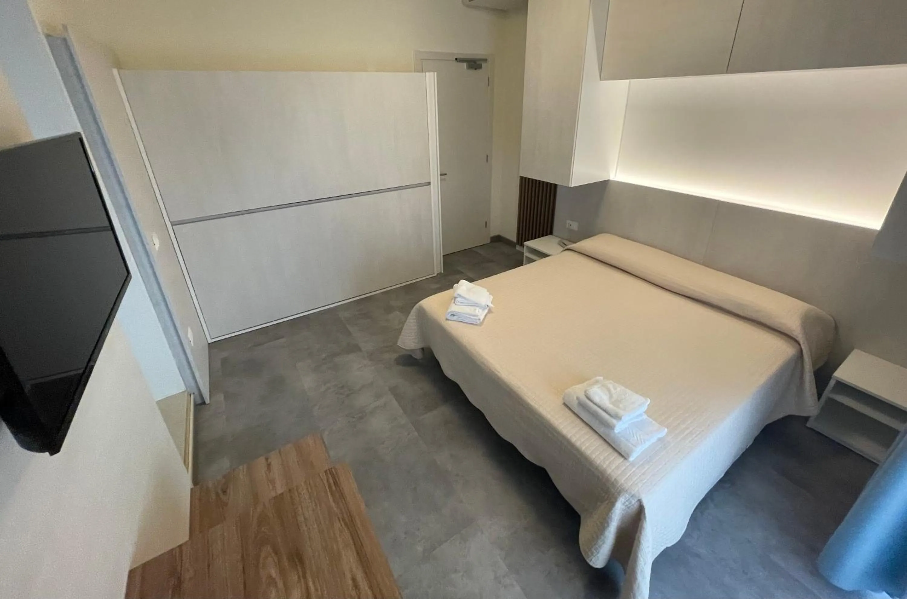 Bed in Hotel Catto Suisse