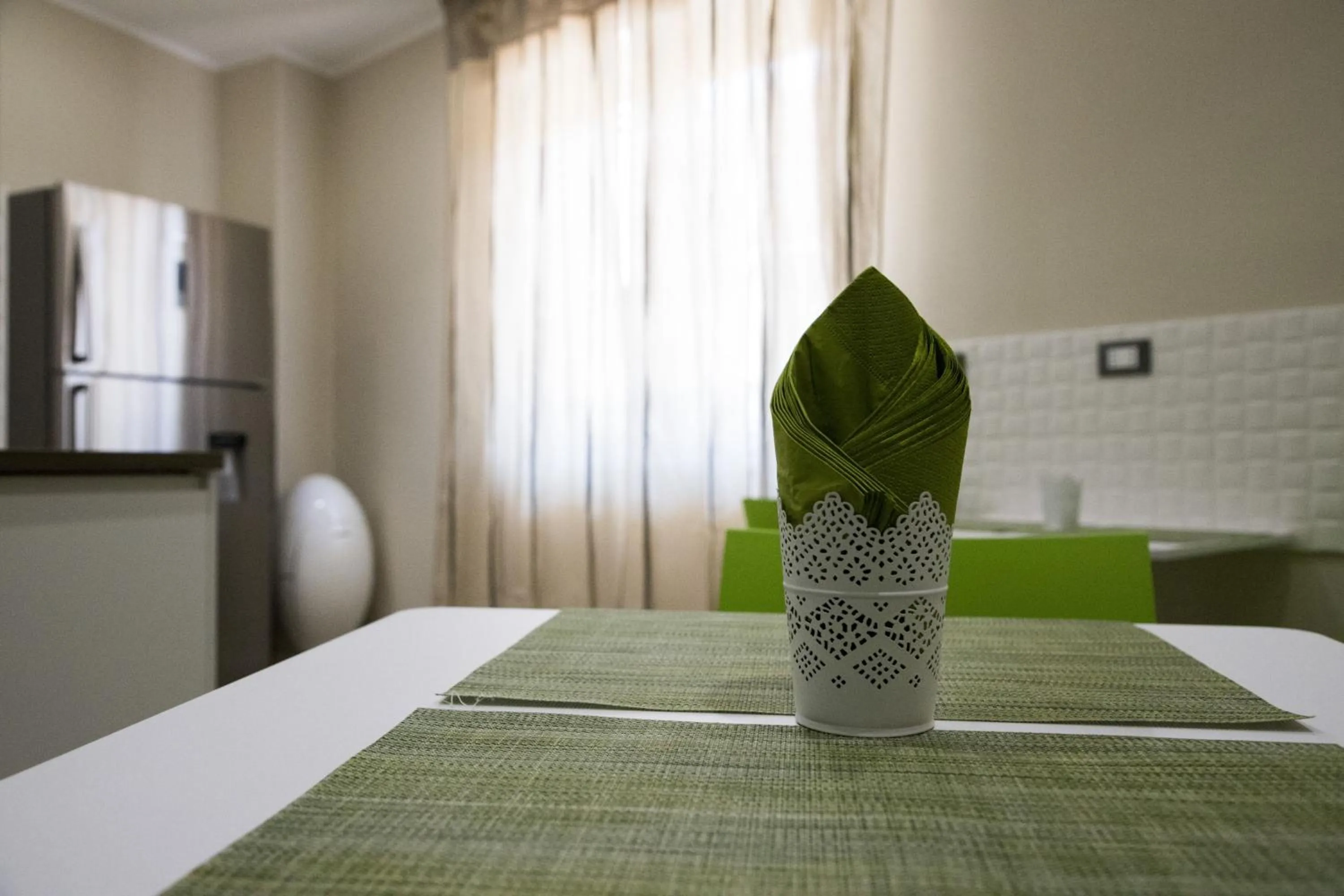 Communal lounge/ TV room, Bed in Tre Fontane