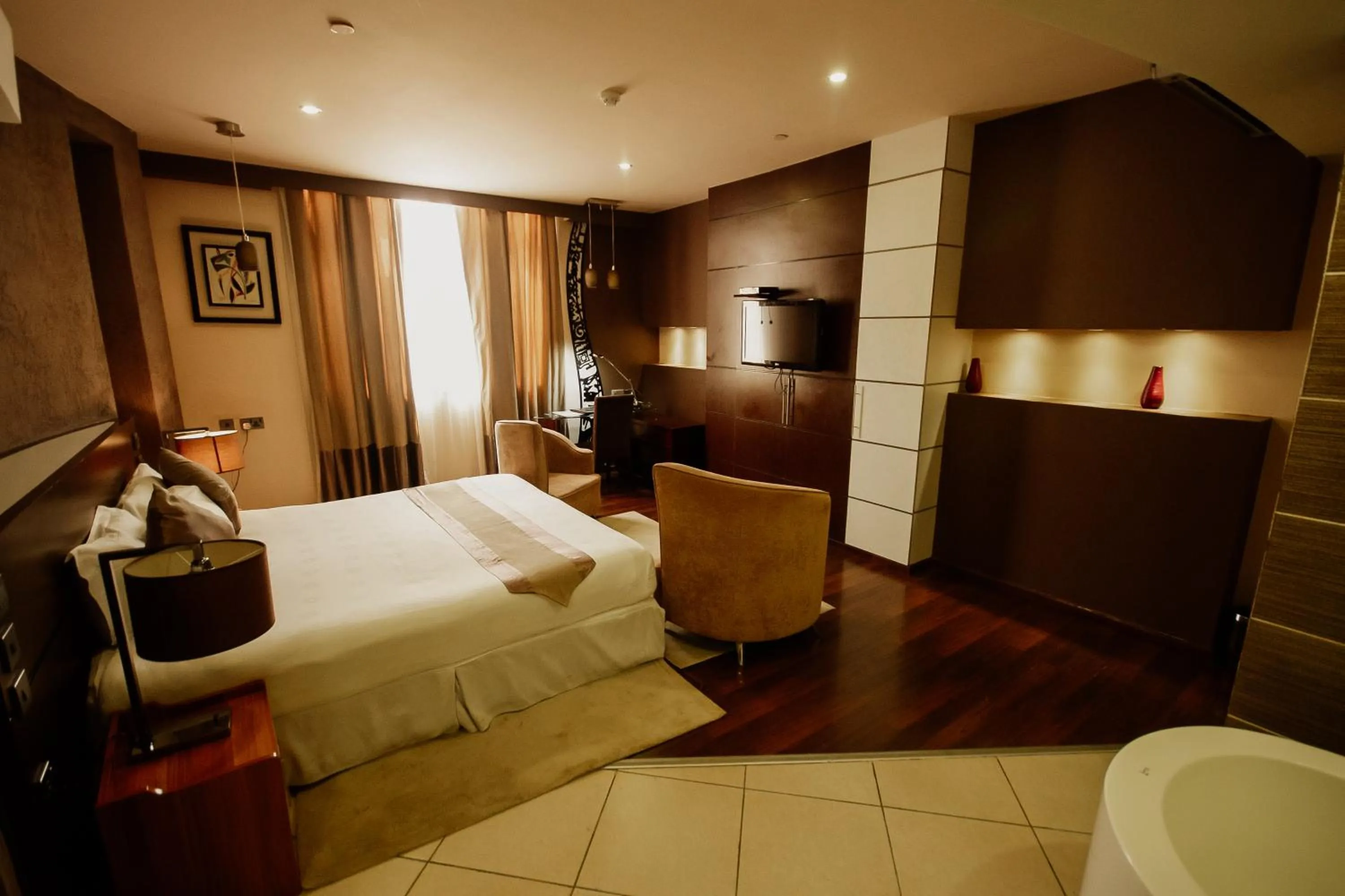Photo of the whole room, Bed in SG Premium Resort