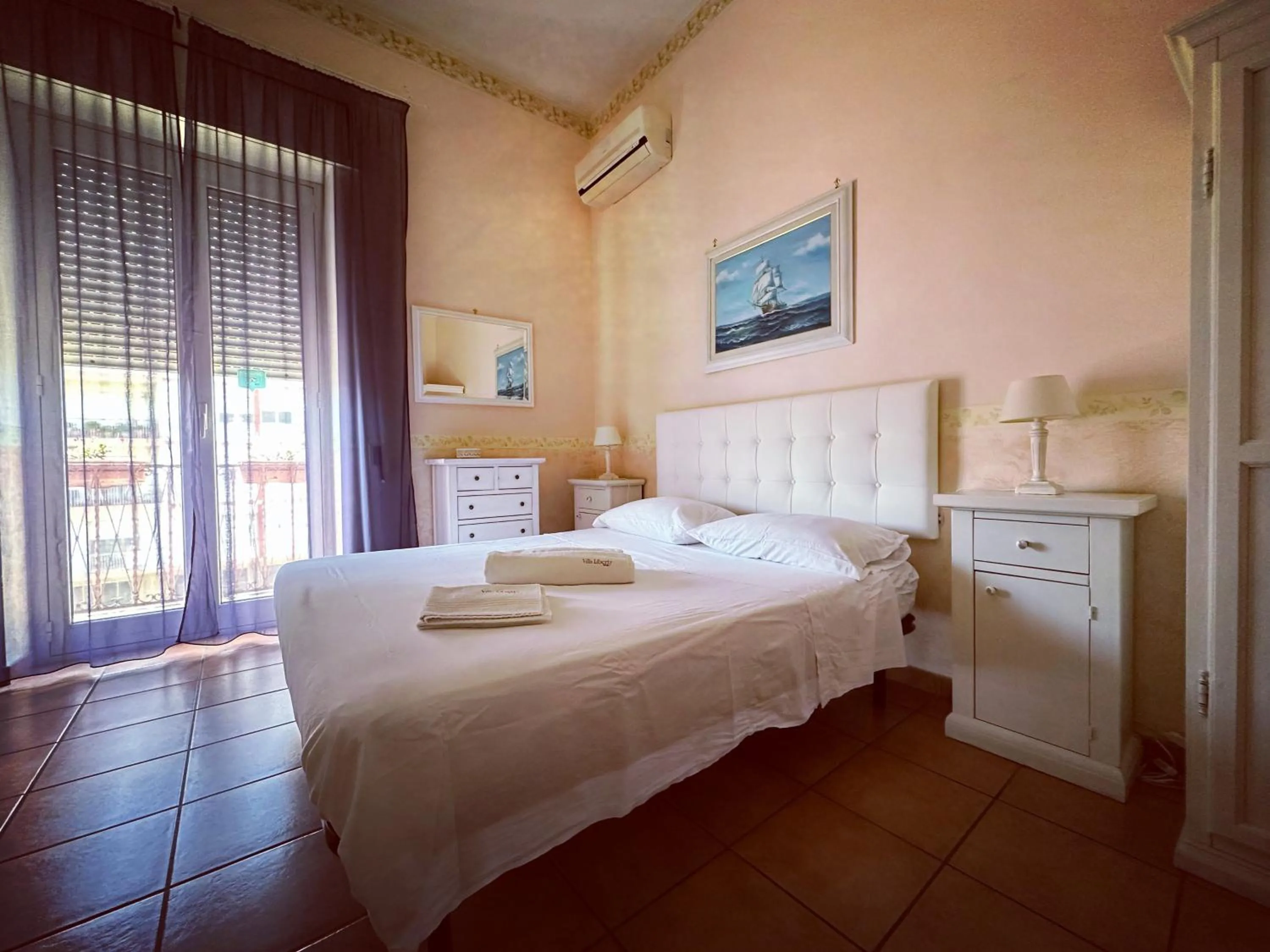 Bed in Villa Liberty Palazzo Gigante