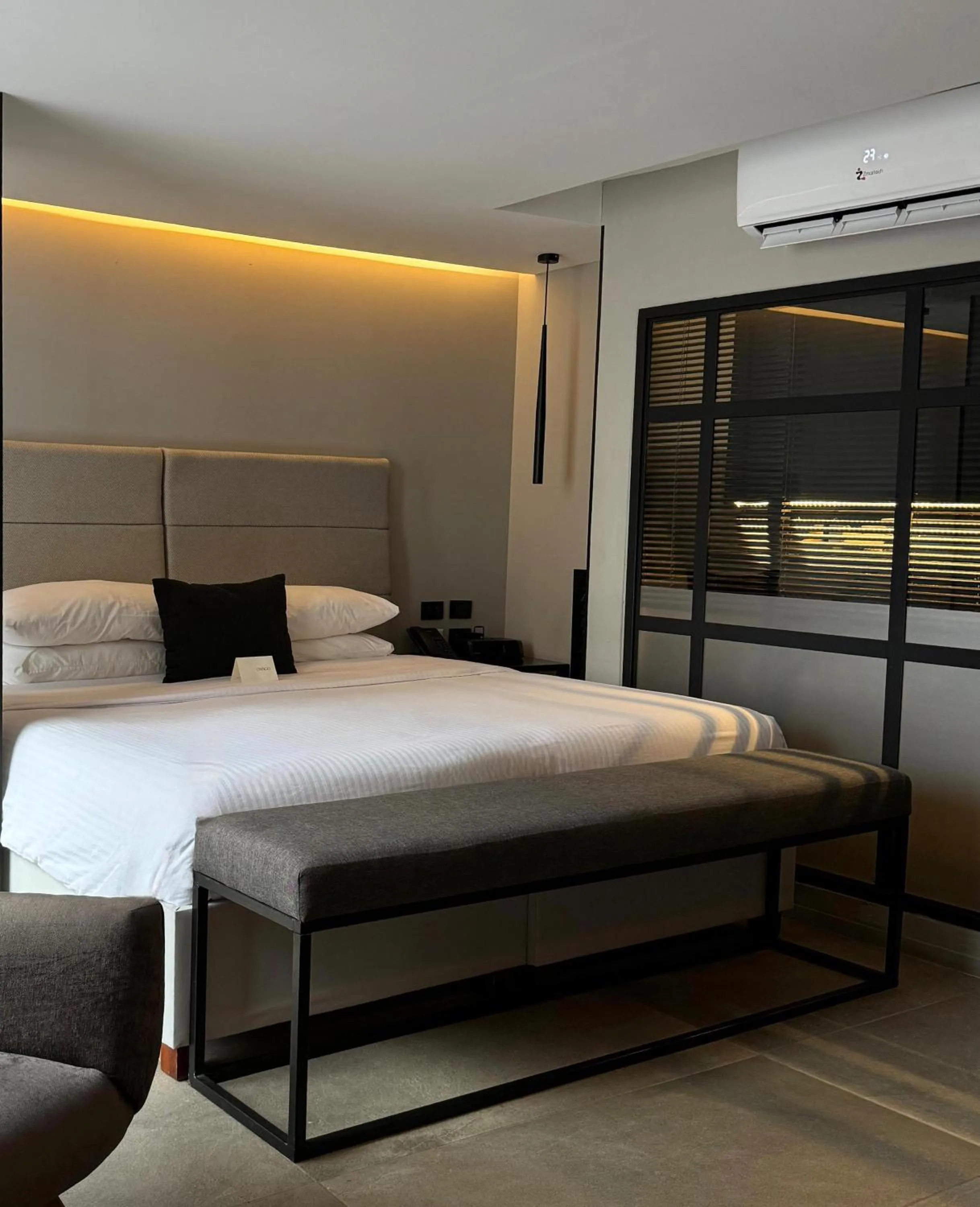 Bed in Ontico Urban Design Hotel
