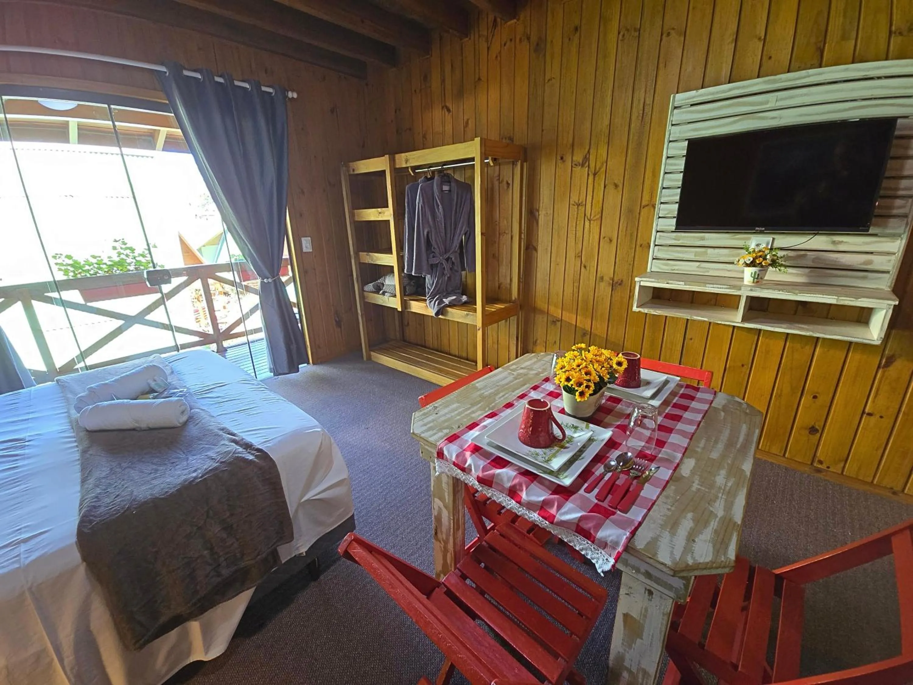 Bed in Chalé Suiço Bombinhas