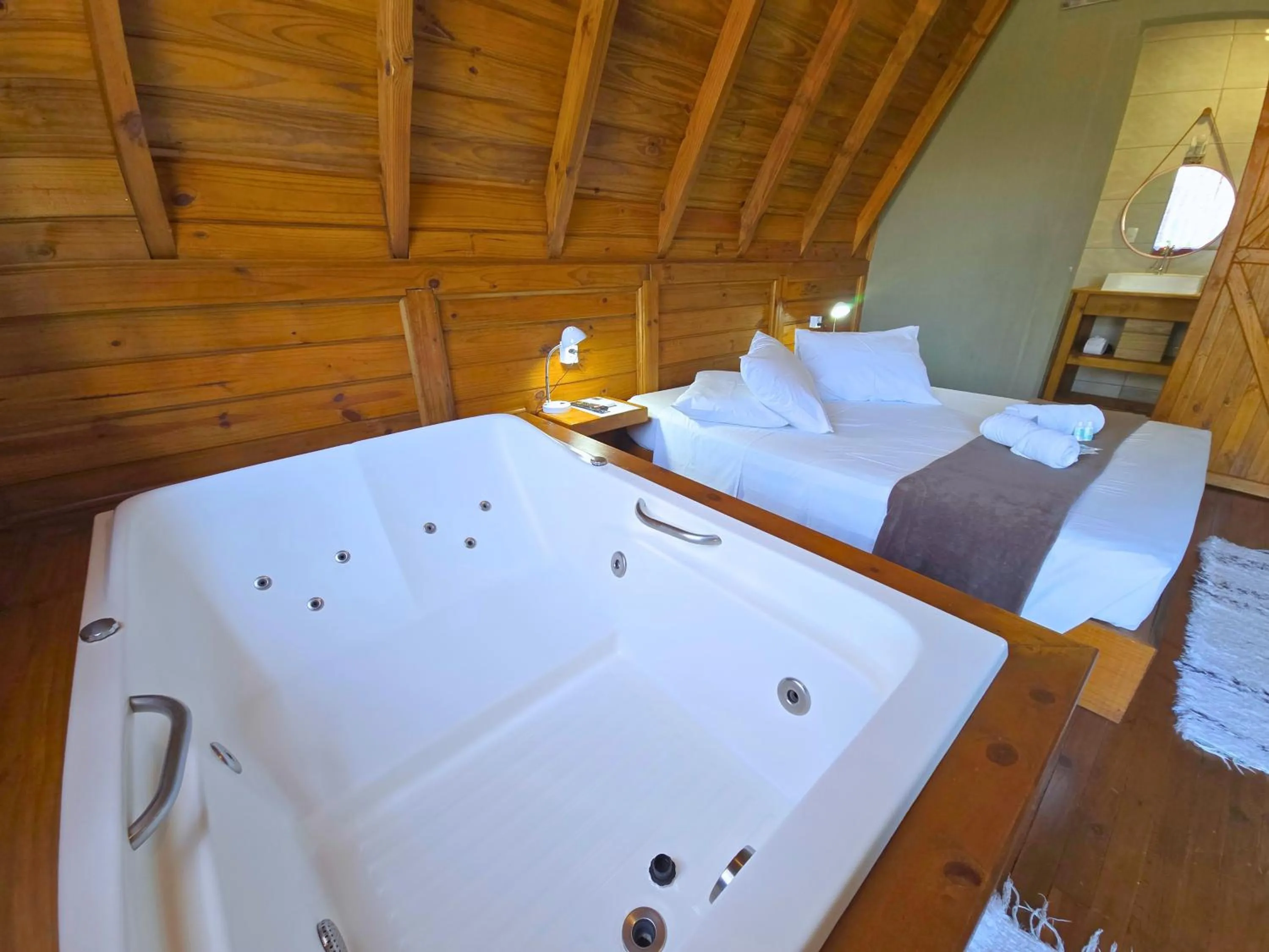 Bed in Chalé Suiço Bombinhas