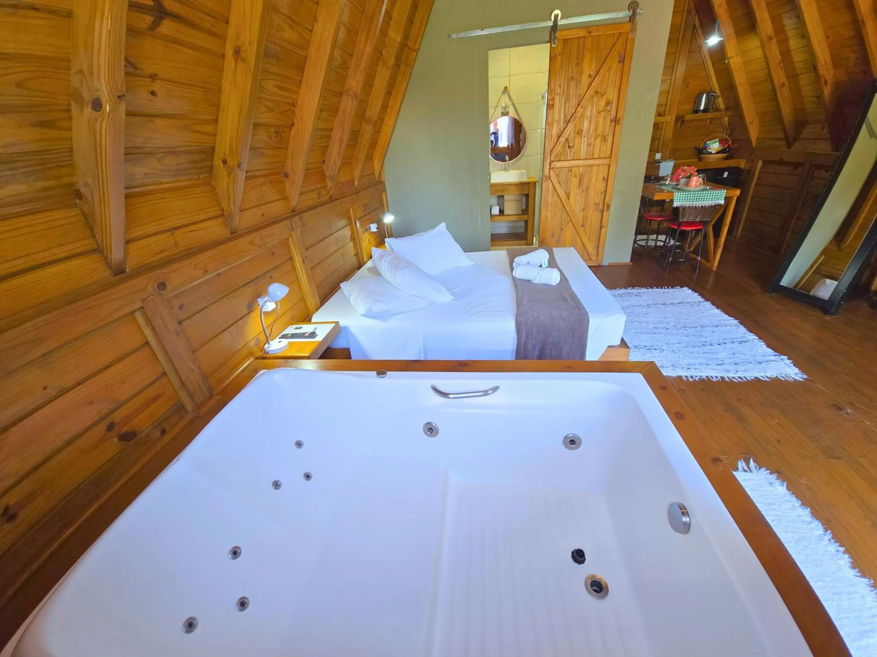 Bed in Chalé Suiço Bombinhas