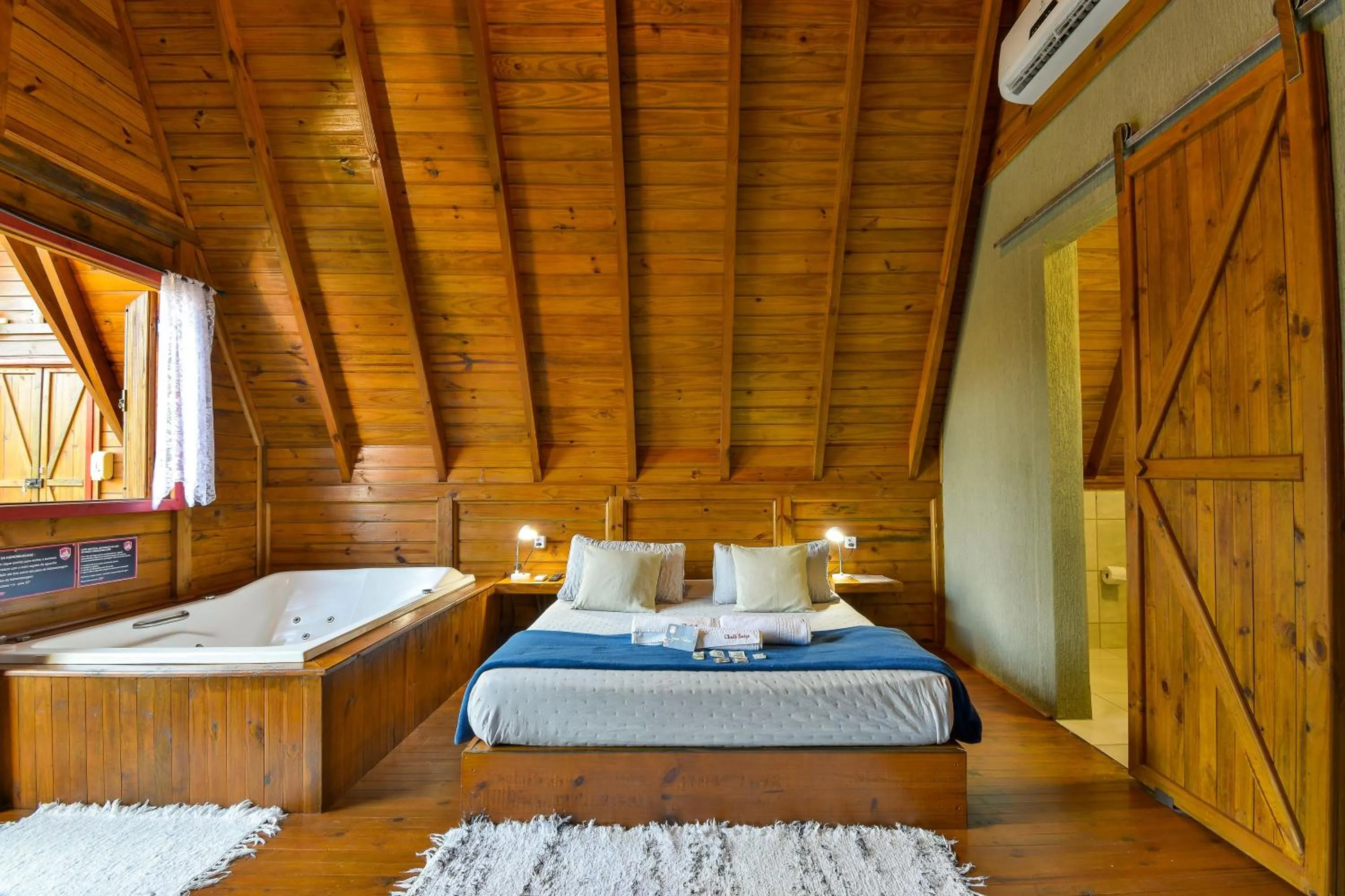 Bed in Pousada Chalé Suiço Bombinhas