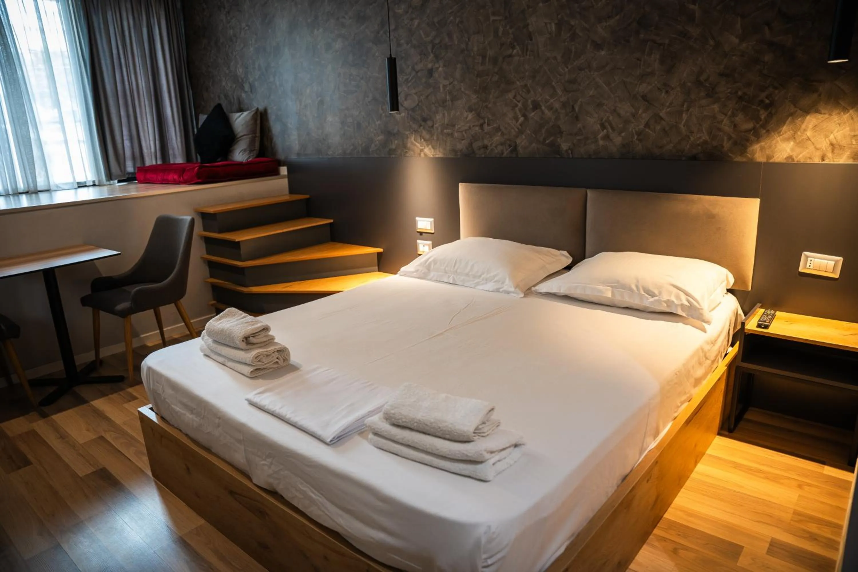 Bed in Center Boutique Hotel