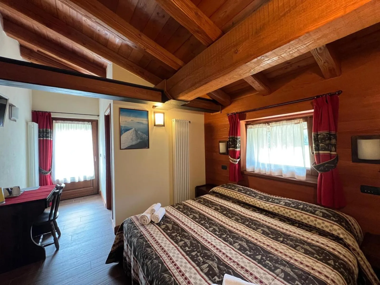 Bed in Villa Americana Chambres d'Hotes