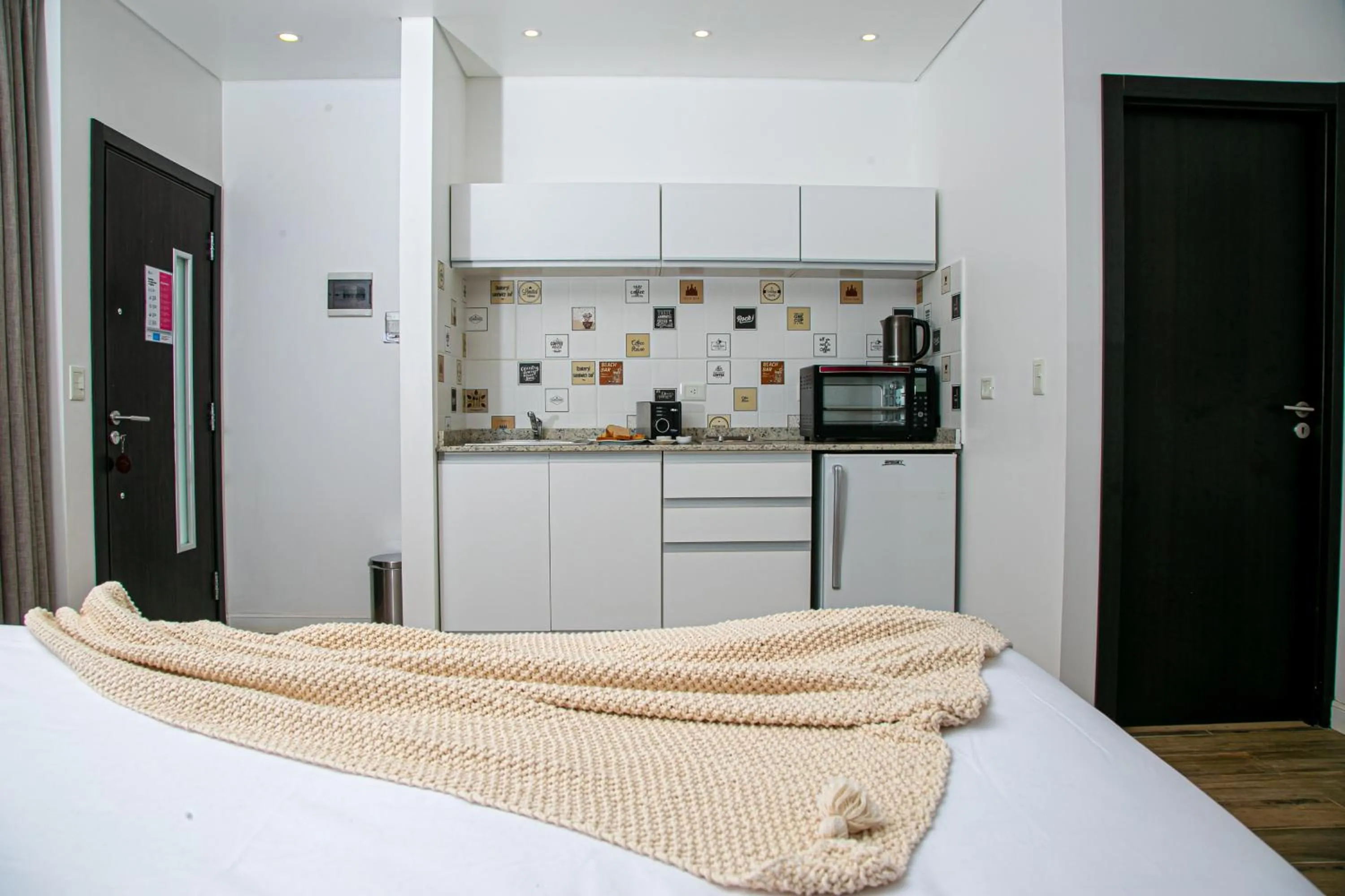 Bed in Senderos Aparts & Suites