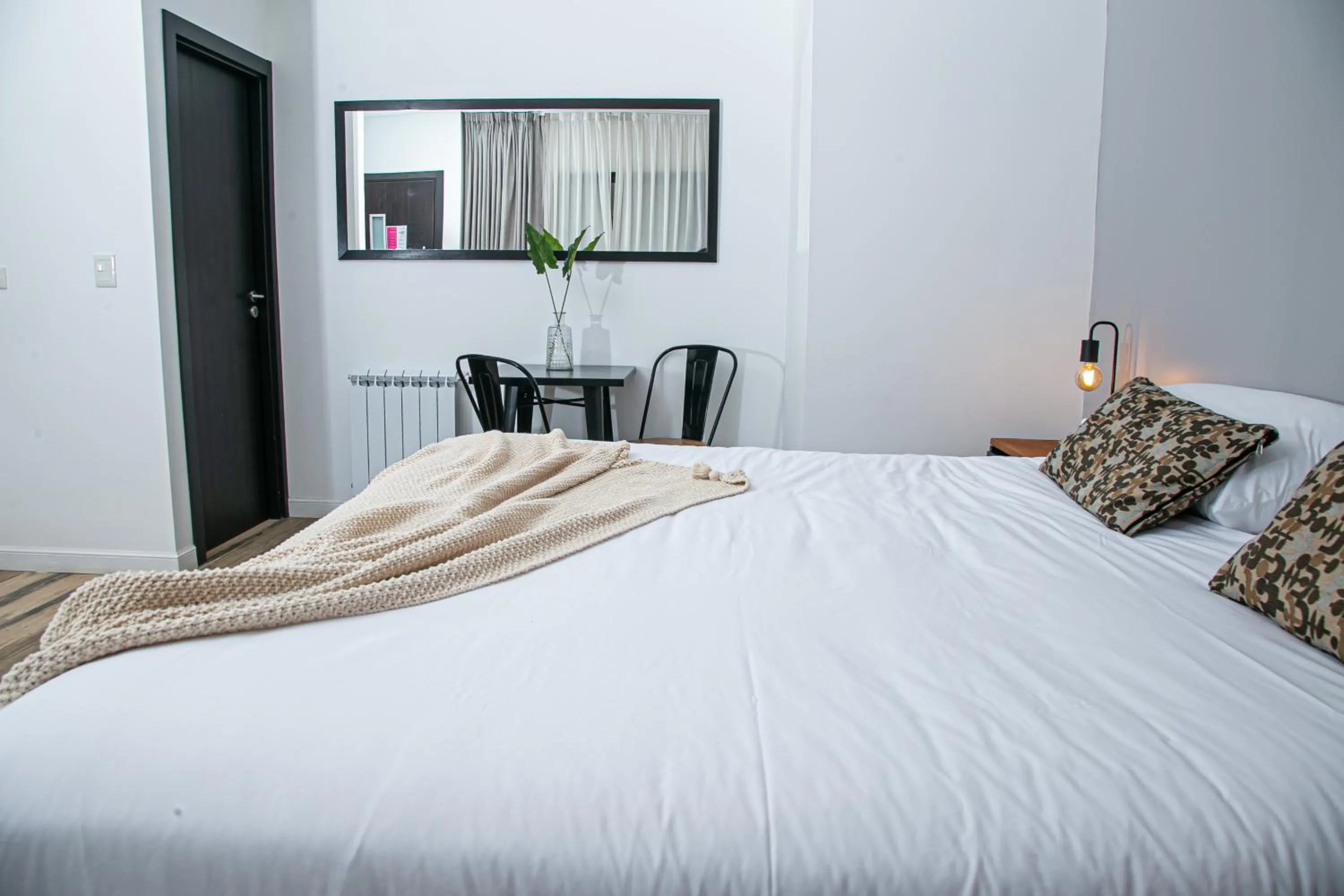 Bed in Senderos Aparts & Suites