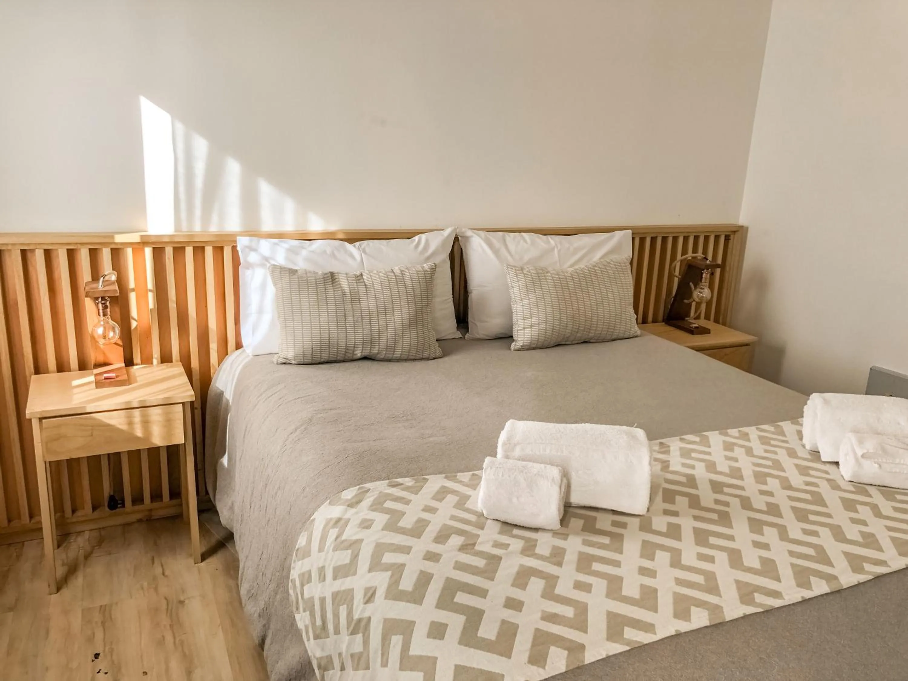 Bed in Senderos Aparts & Suites