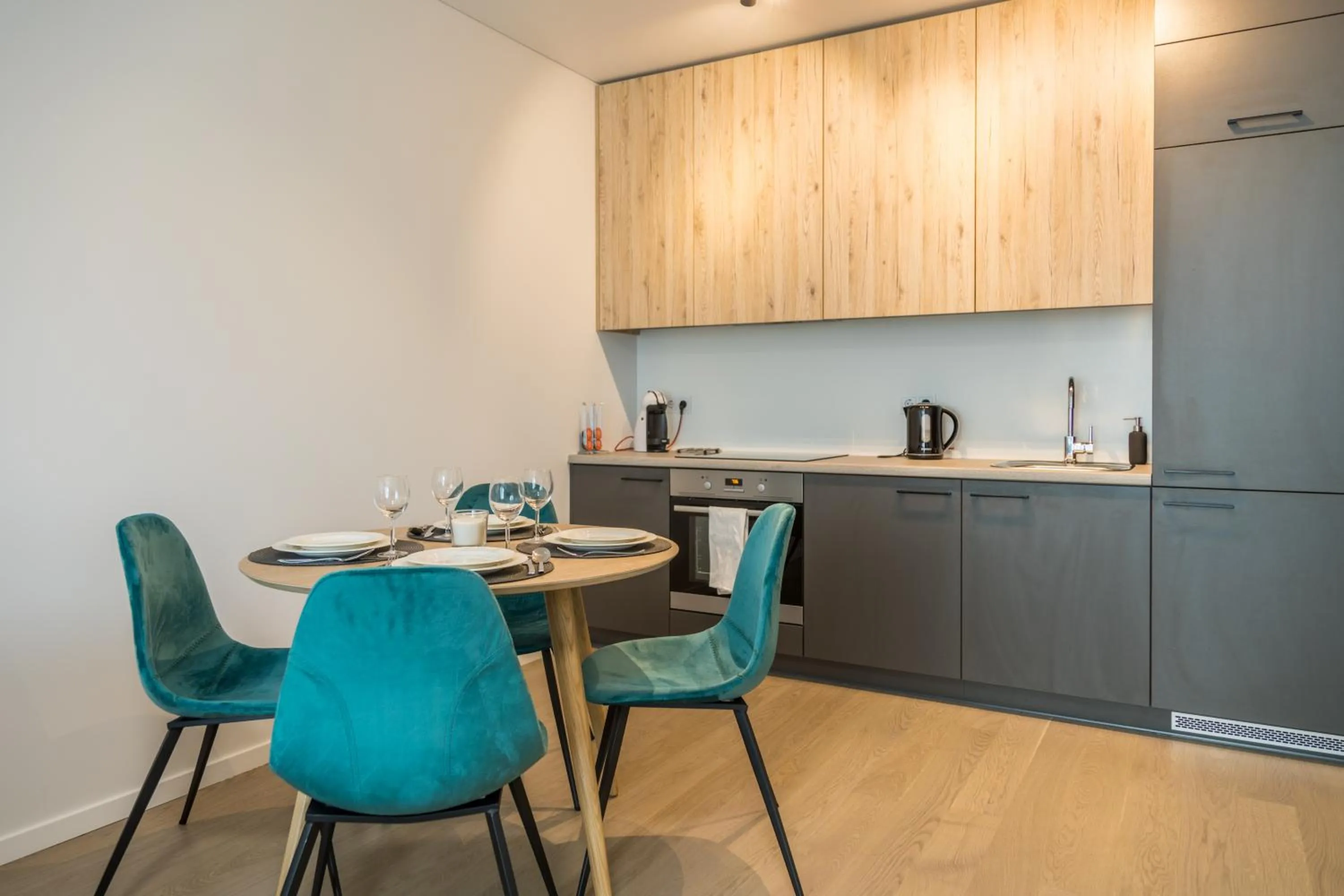 Kitchen or kitchenette in Apartment Hotel Laisve