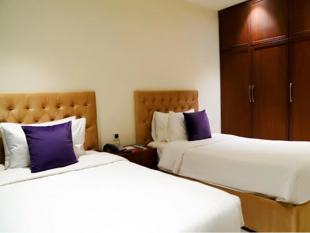 Bedroom, Bed in Indigo Heights Hotel & Suites