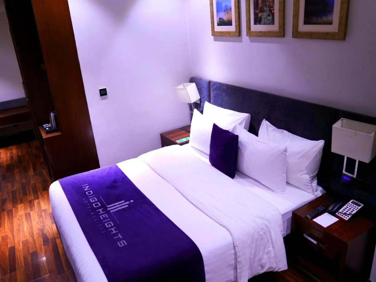 Bed in Indigo Heights Hotel & Suites