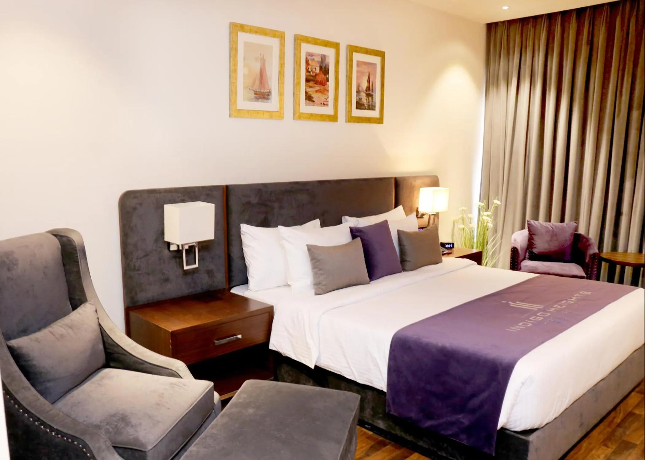 Bed in Indigo Heights Hotel & Suites