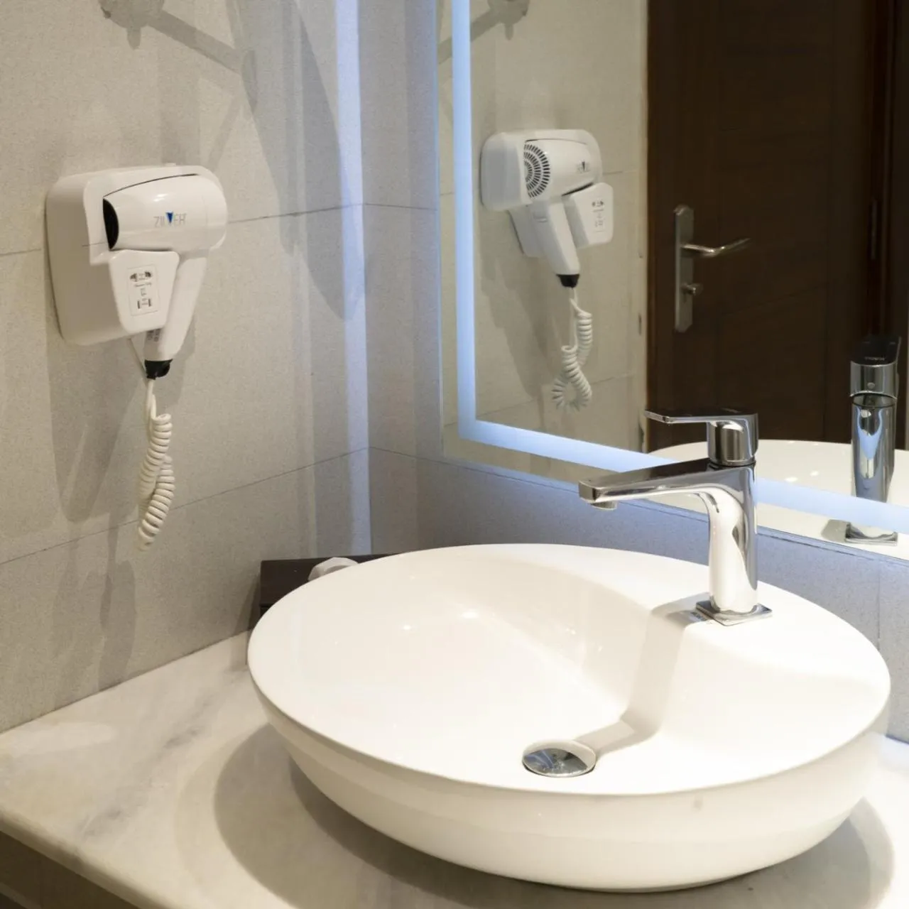 Bathroom in Indigo Heights Hotel & Suites