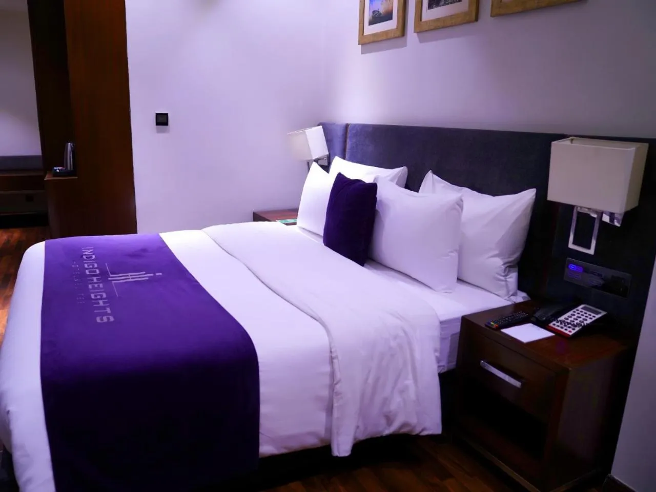 Bed in Indigo Heights Hotel & Suites