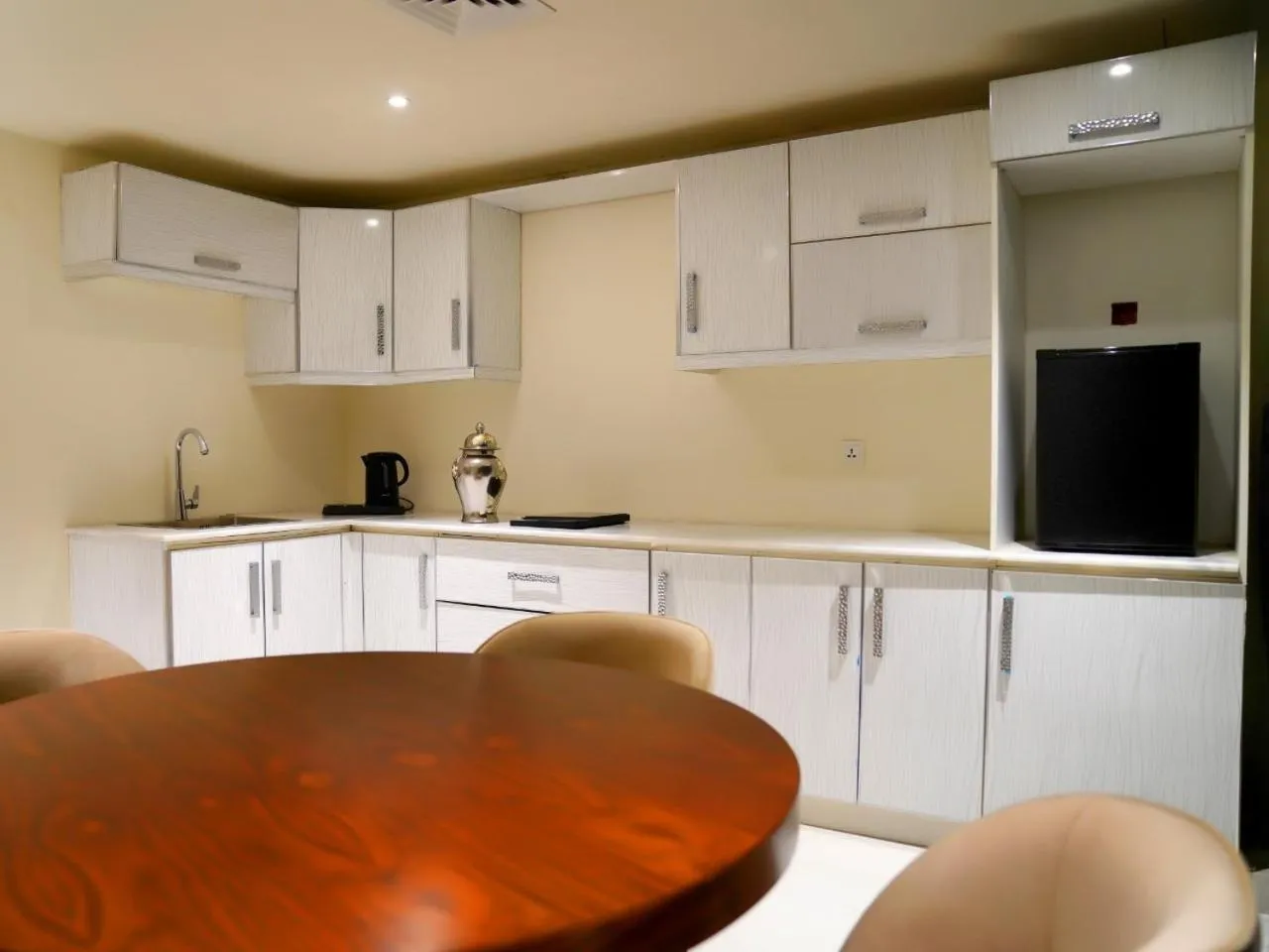 Kitchen or kitchenette in Indigo Heights Hotel & Suites