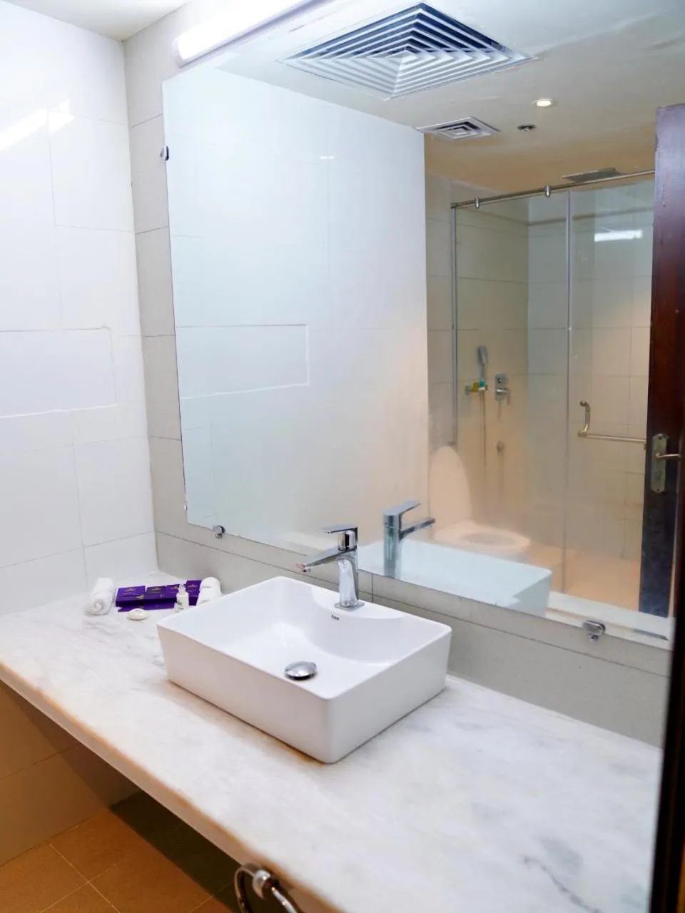 Bathroom in Indigo Heights Hotel & Suites