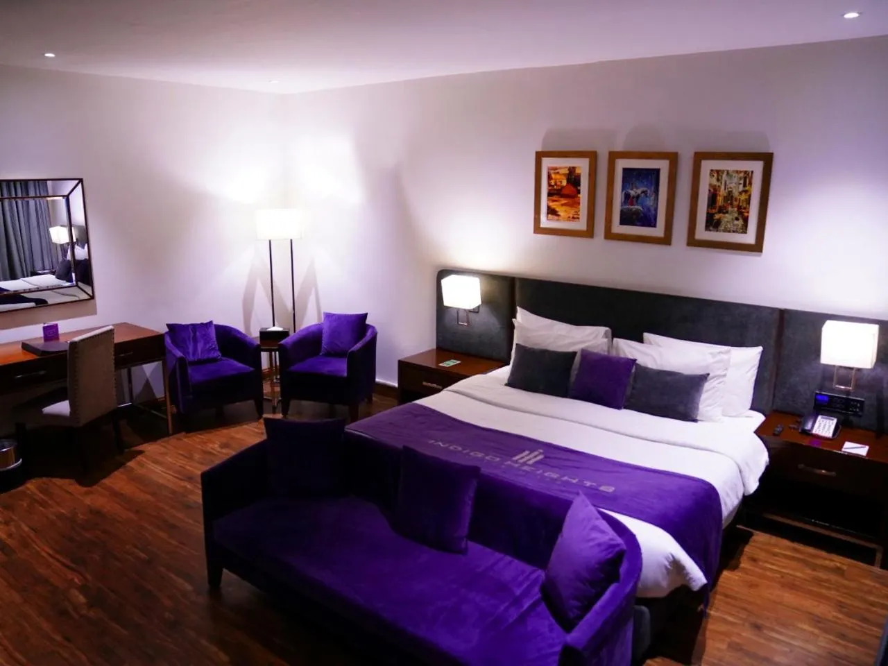 Bed in Indigo Heights Hotel & Suites