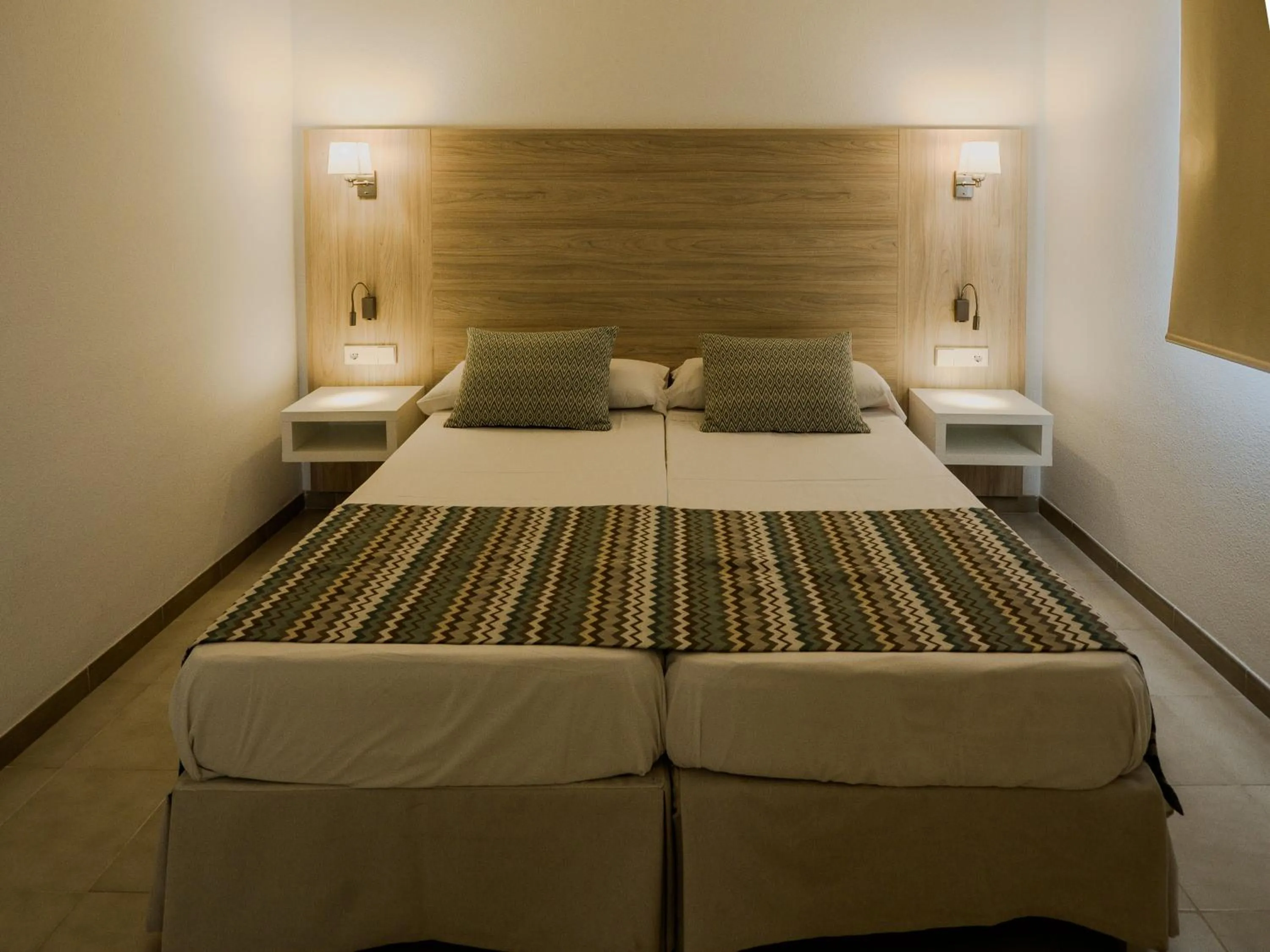 Bed in Apartamentos La Santa Maria