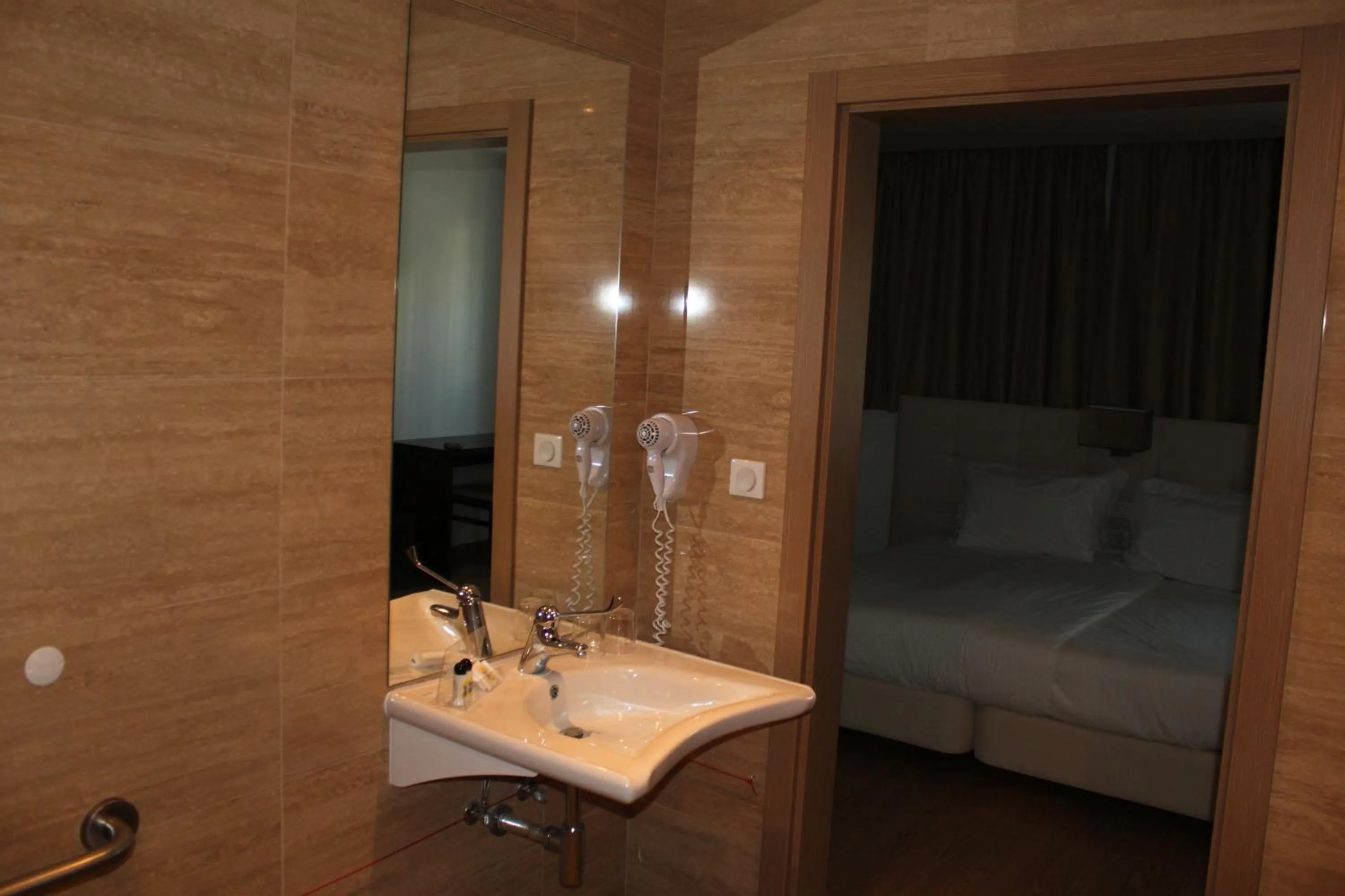 Bedroom in Hotel O Gato & Spa