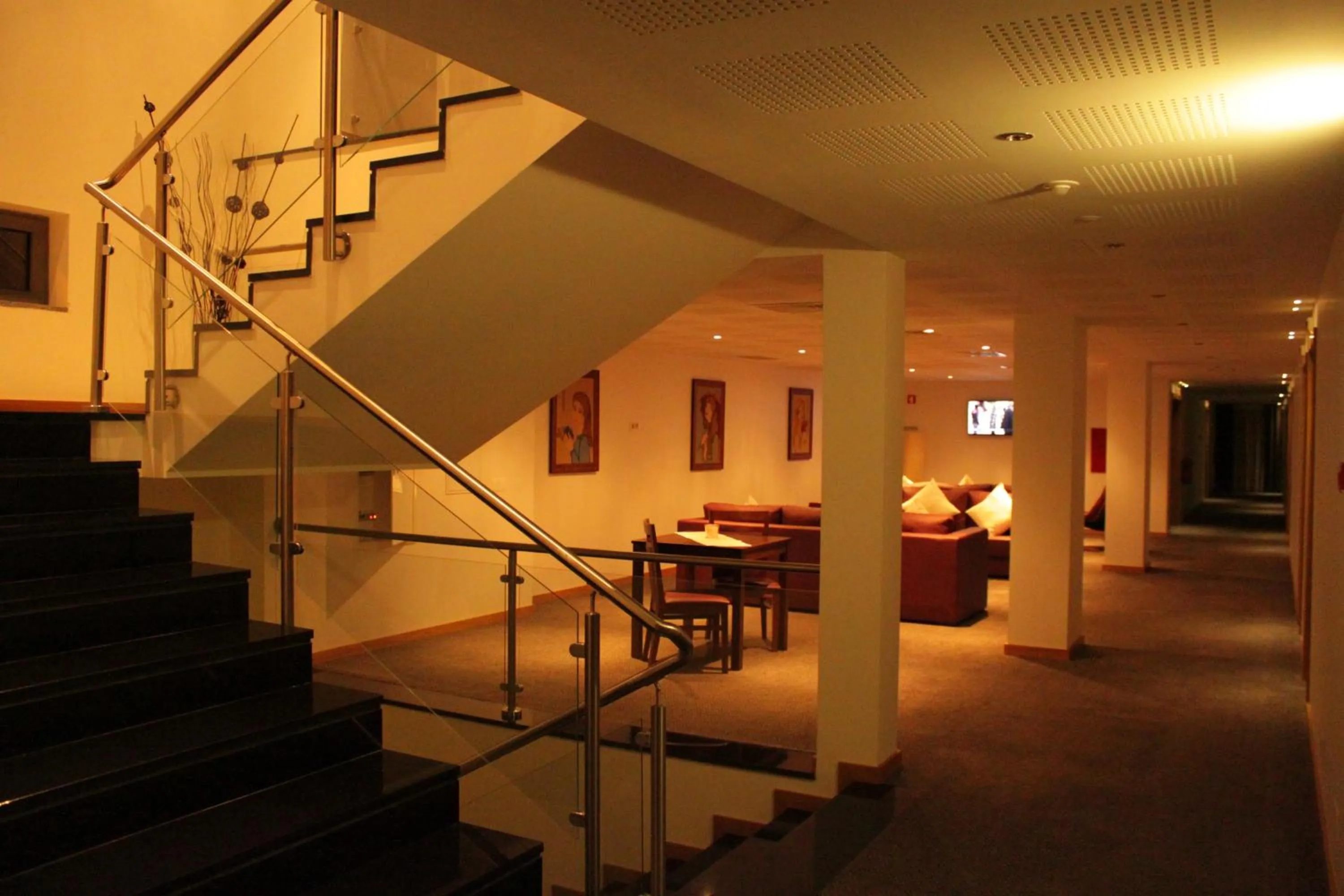 Communal lounge/ TV room in Hotel O Gato & Spa