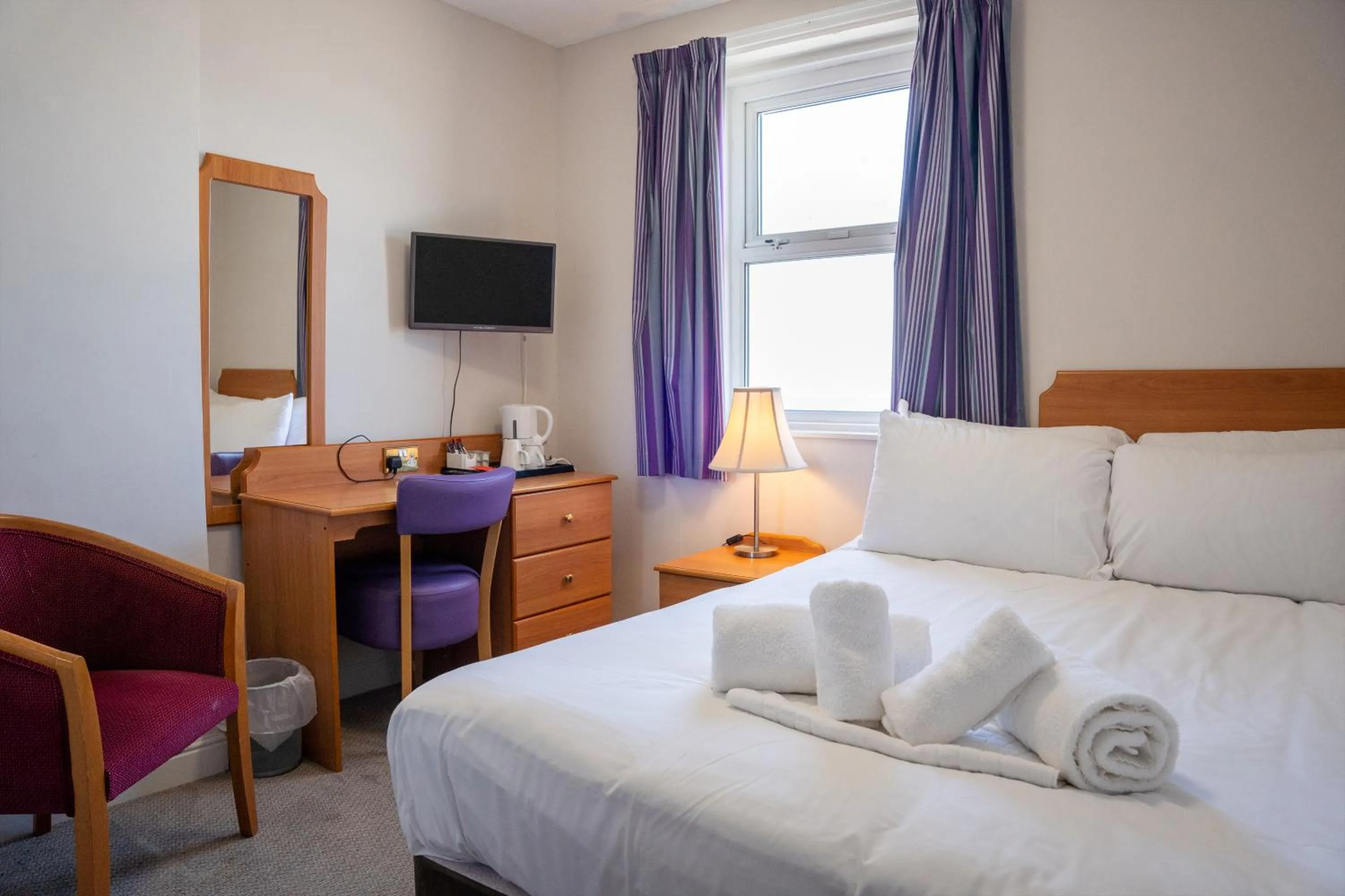 Bed in The Seafront Hotel by Compass Hospitality