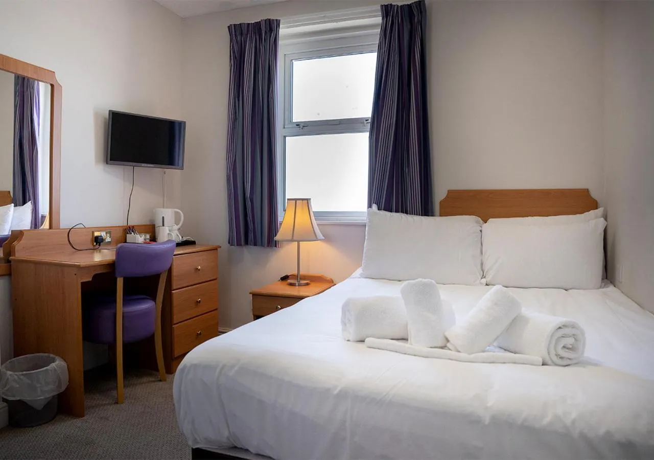 Bed in The Seafront Hotel by Compass Hospitality