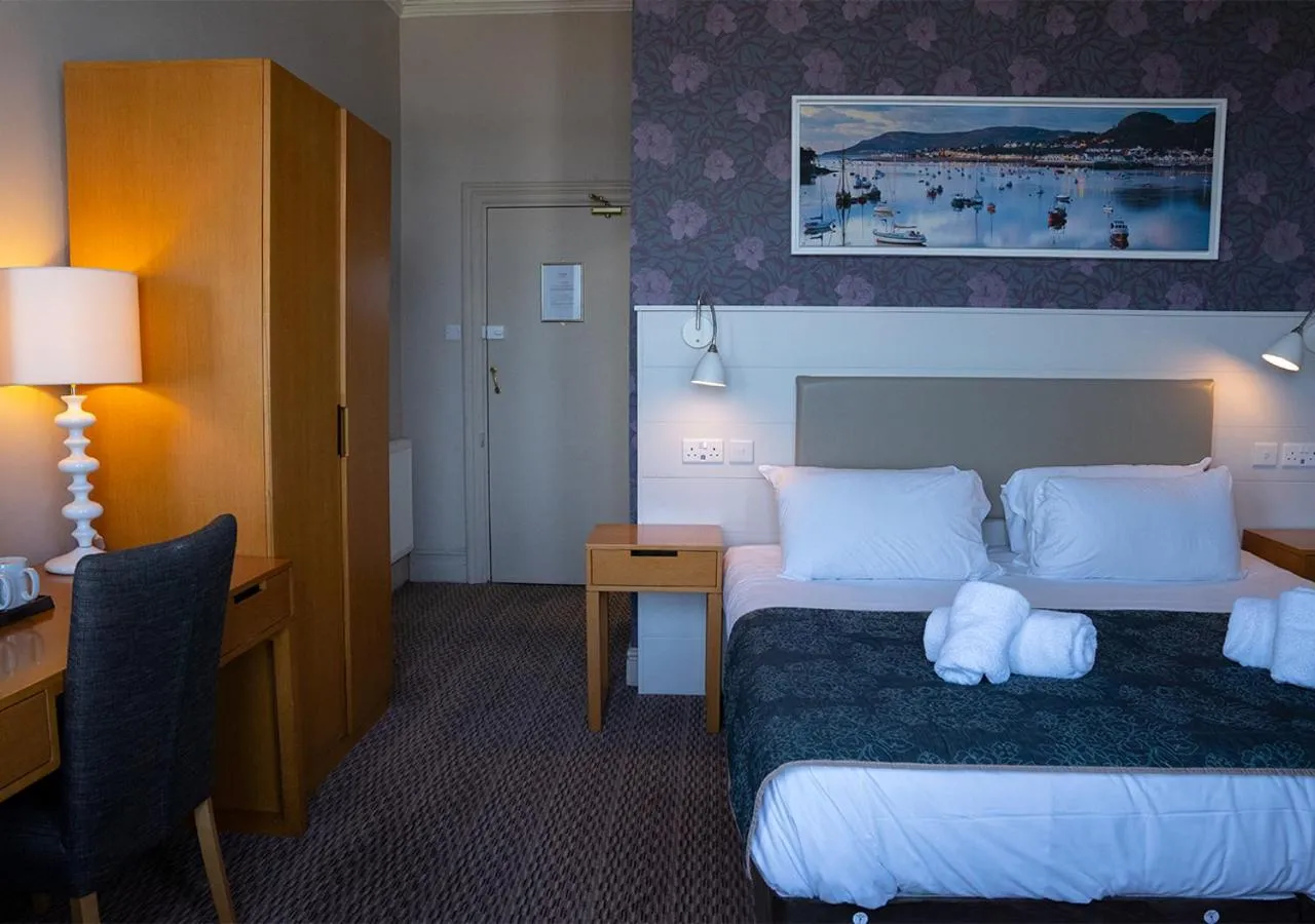 Bed in The Seafront Hotel by Compass Hospitality