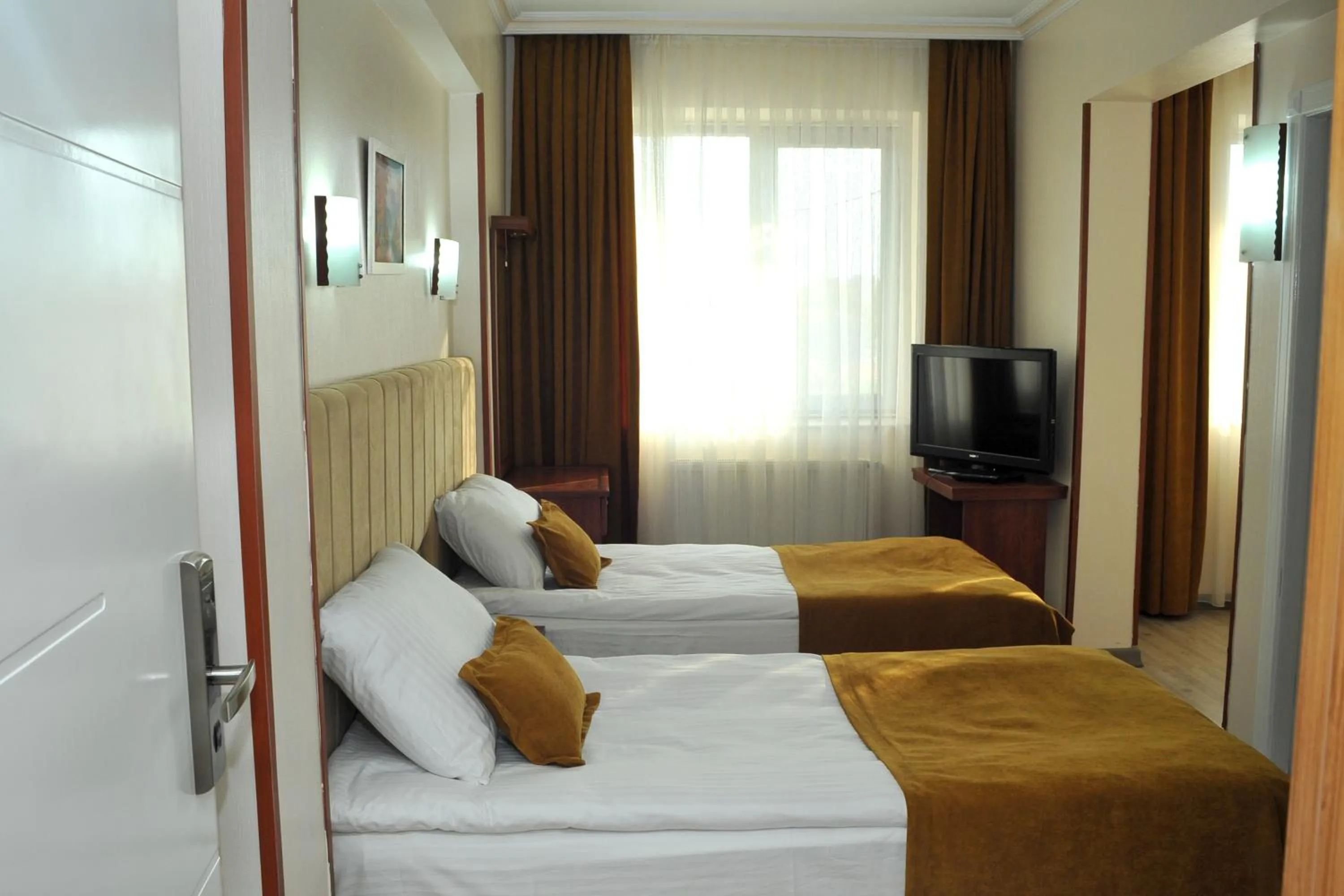 Photo of the whole room, Bed in Lion City Hotel Ankara