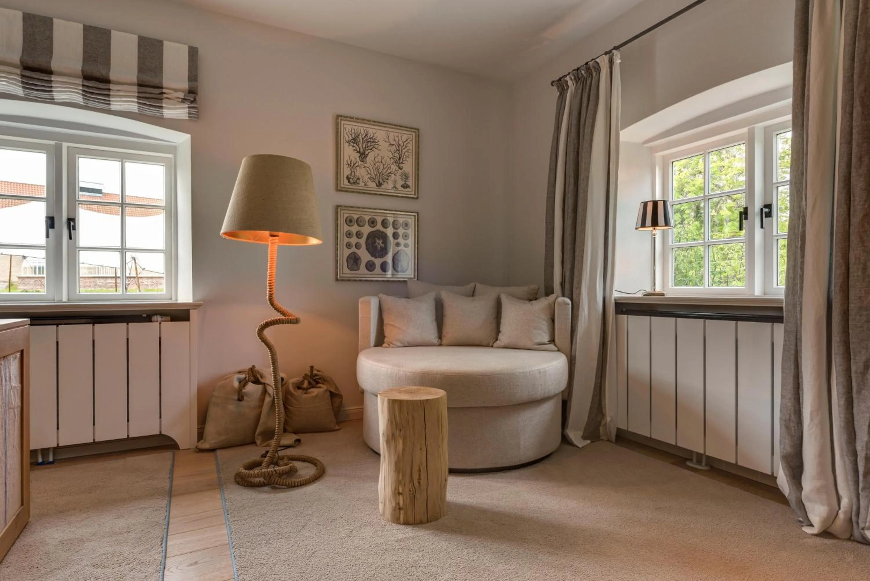 Seating area, Bed in Weissenhaus Private Nature Luxury Resort