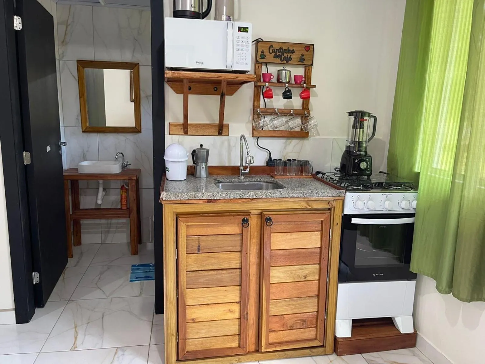Kitchen or kitchenette in Paraiso do Estaleirinho - Balneario Camboriu