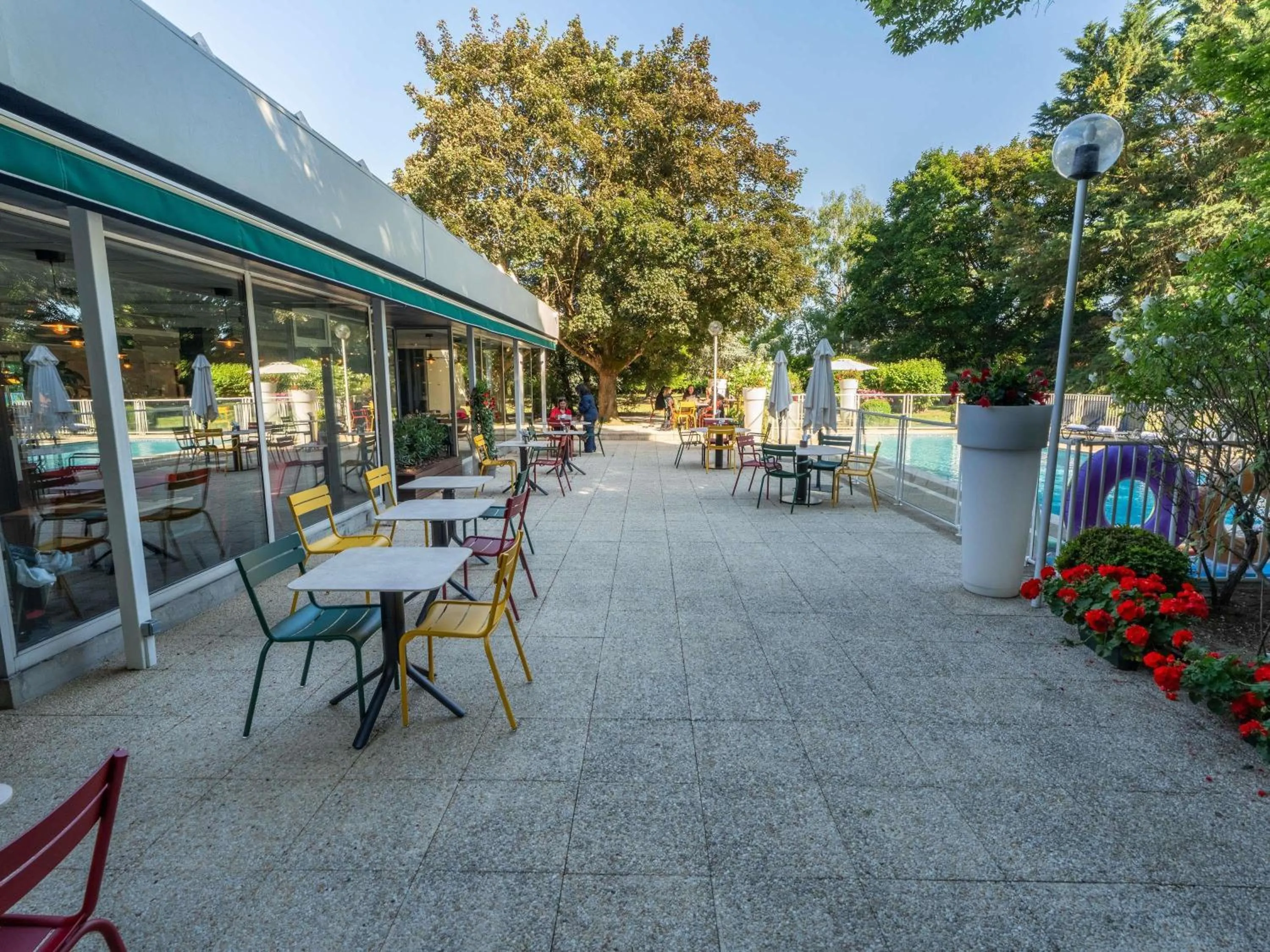 Lounge or bar in Novotel Poissy Orgeval