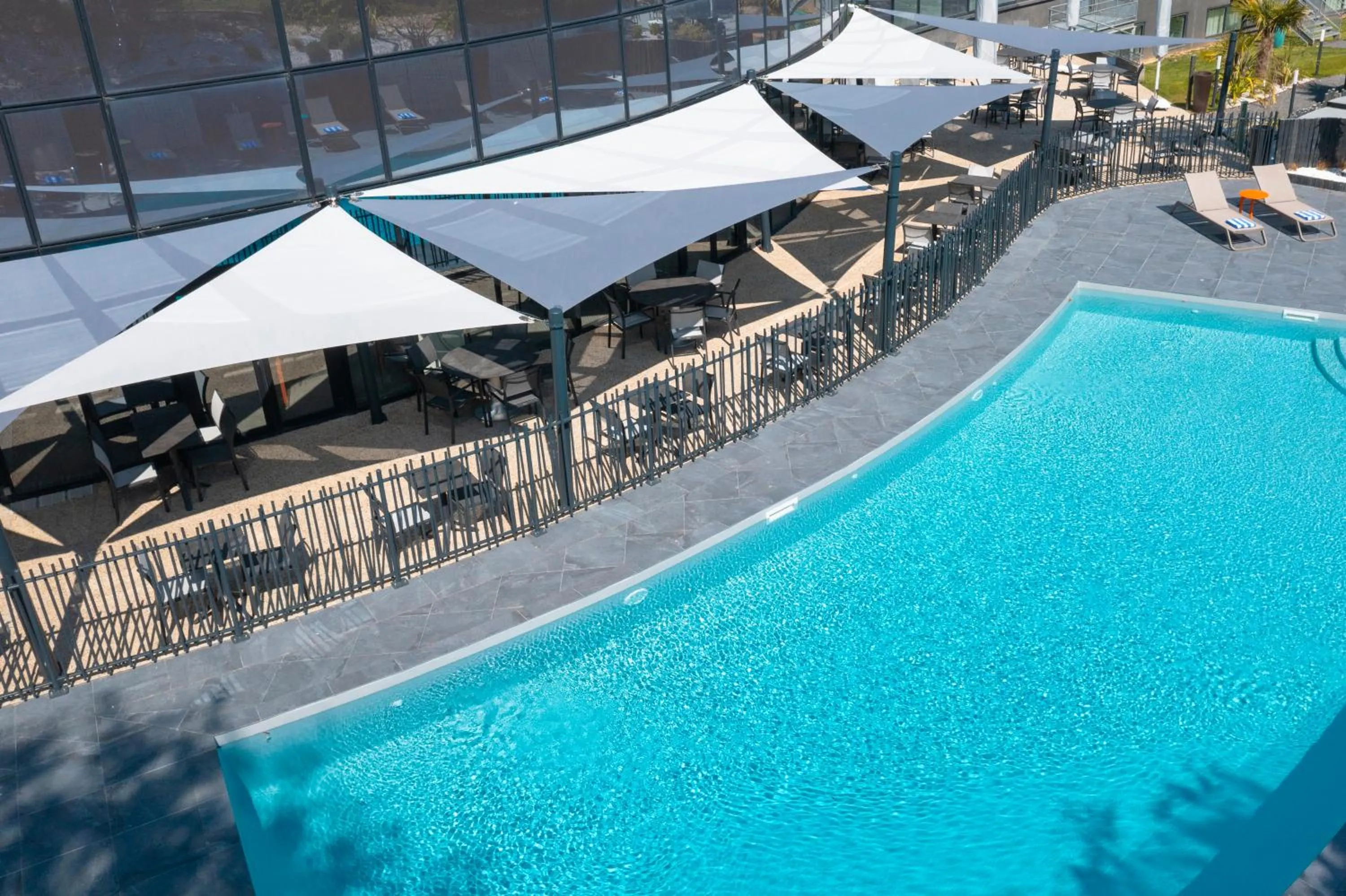 Pool view in Novotel Poitiers Site du Futuroscope